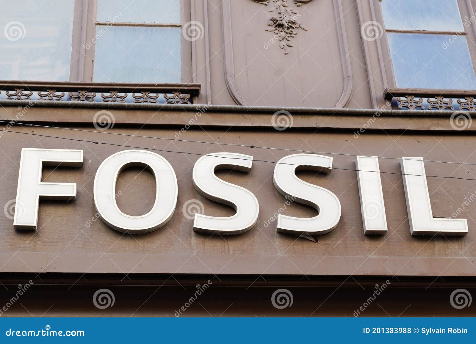 Fossil Sign and Text Logo of Store Maker of Clothing and Watches ...