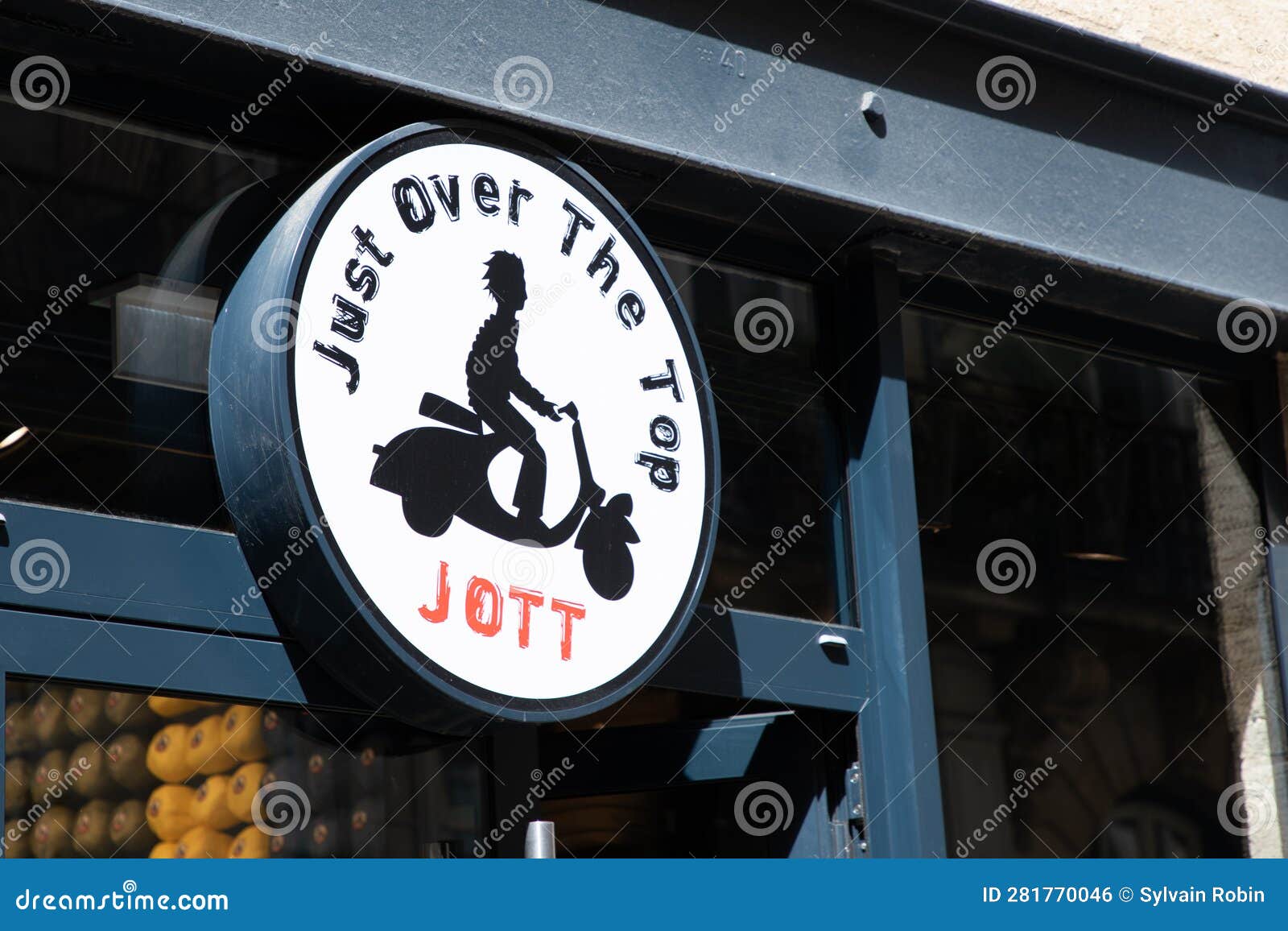 Jott Sign Text and Logo Brand Shop Wall Facade Just Over the Top Front ...
