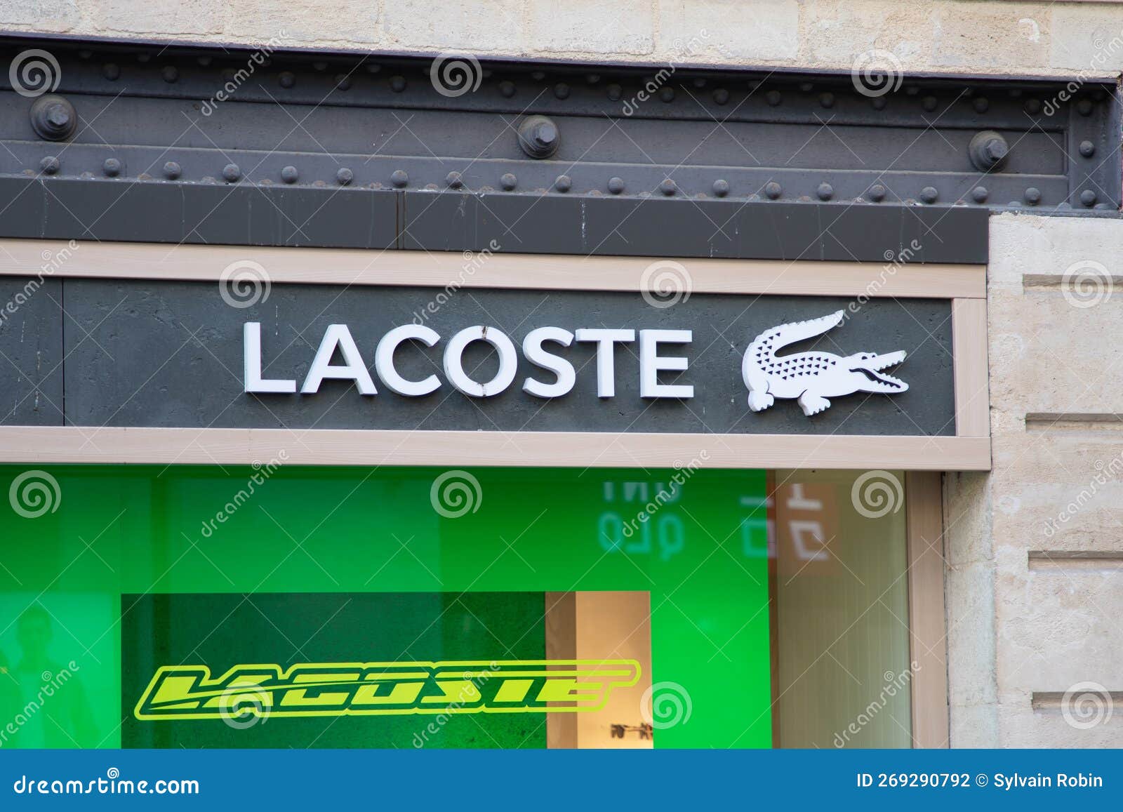 Lacoste Logo Brand Fashion Shop and Text Sign Store Green Facade ...