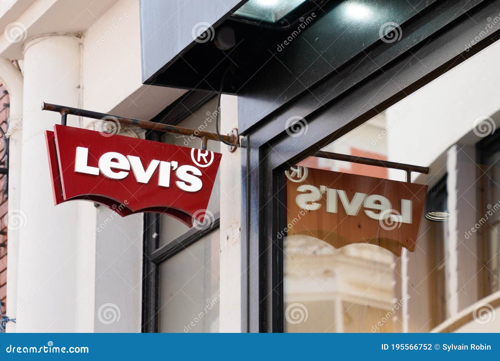 Levi`s Logo Red Sign and Text Front of Jeans Levis Store of Clothing  Fashion Levi Editorial Photography - Image of glasses, illustrative:  195566752