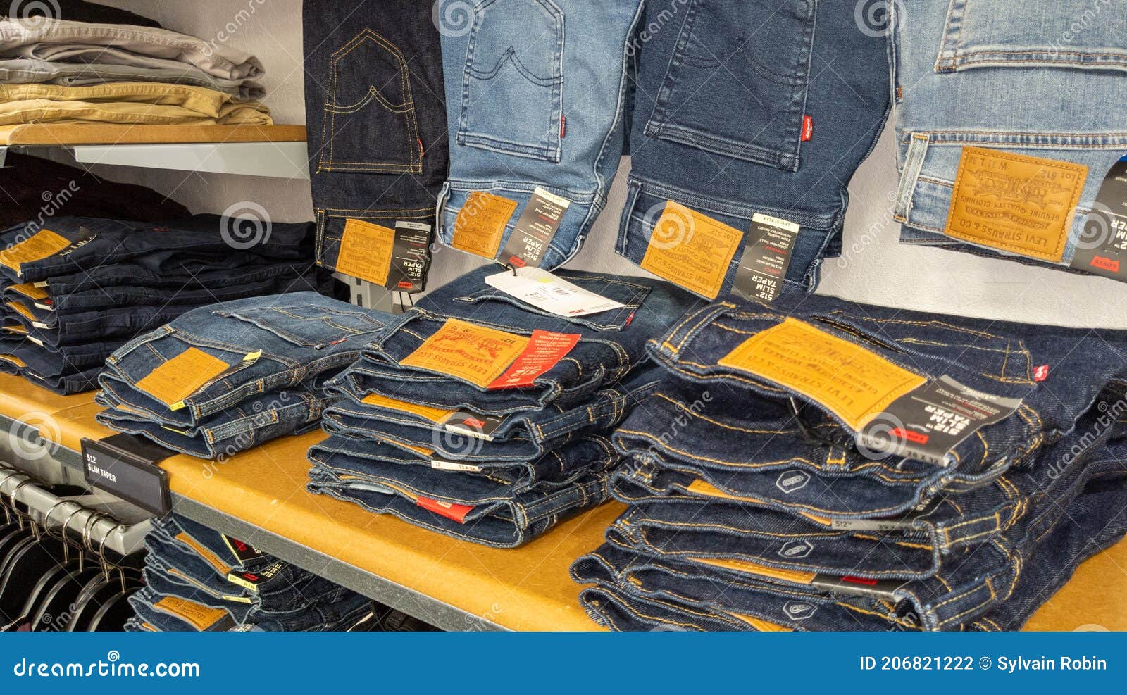 Levis Jeans Placed on the Shelves of the Store for Sale with the Labels and  Logo Sign Editorial Photography - Image of jeans, fashion: 206821222