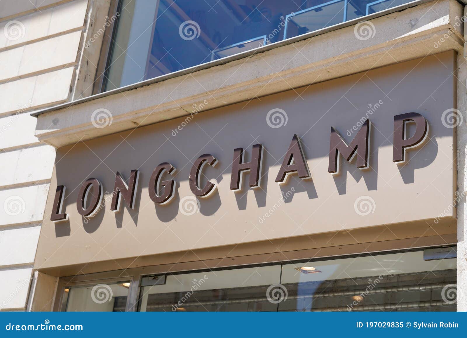 Longchamp Sign and Logo of Store Luxury French Brand Owned by LVMH