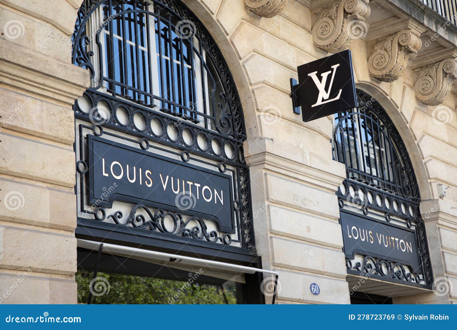 Louis Vuitton Logo Brand Store and Sign Facade Text Shop on