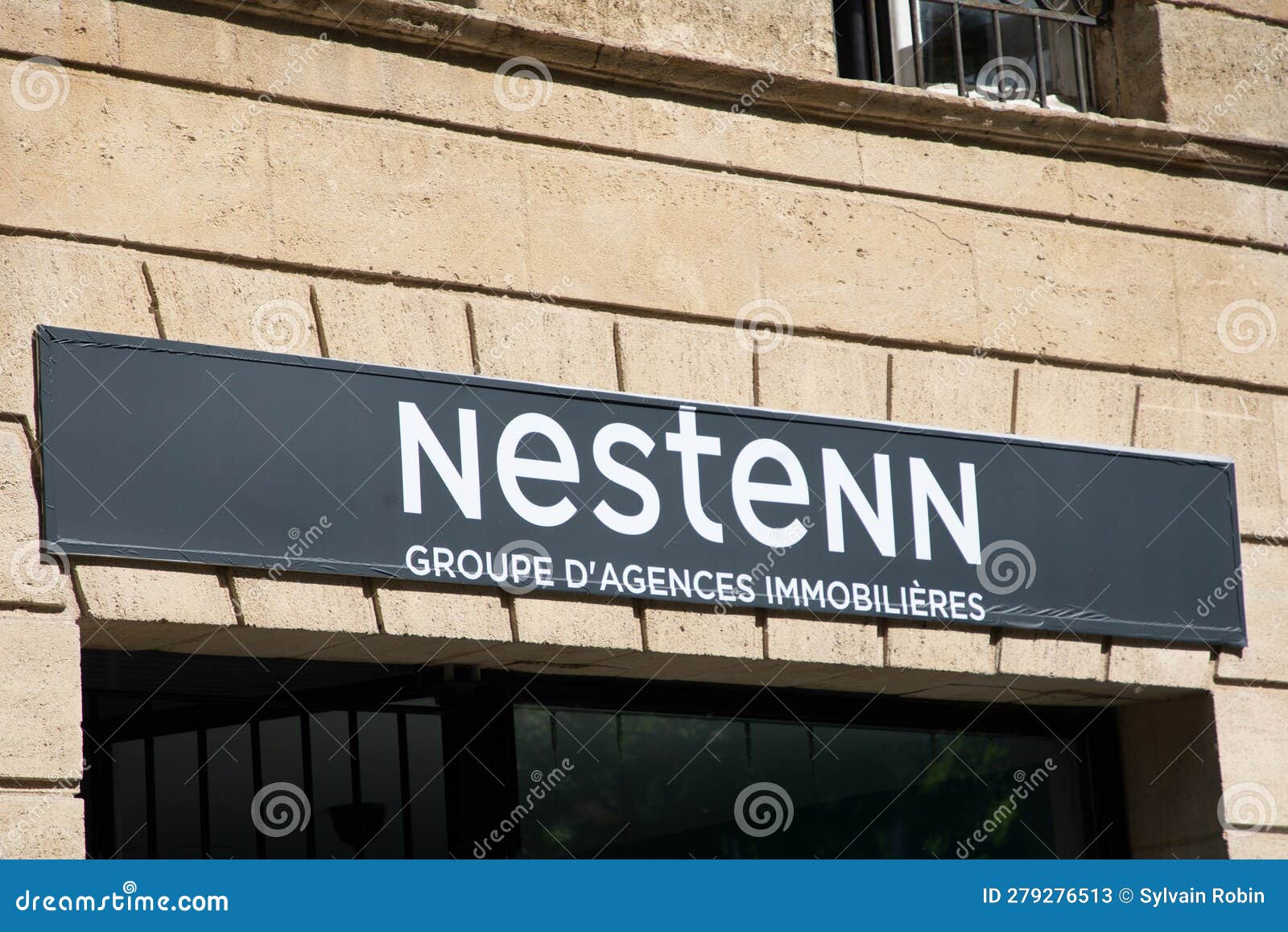 Nestenn Sign Brand and Text Logo Front Facade Entrance Building Store ...