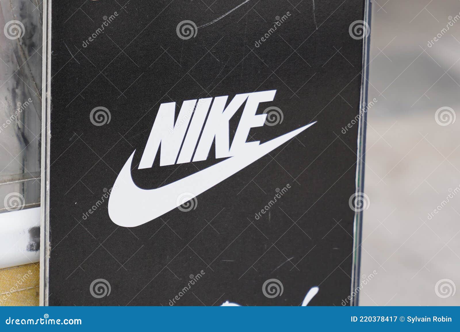 Nike Logo Sign and Brand Text Front of Store of American Shop Sporty  Manufactures Shoes Editorial Photography - Image of front, fashionable:  220378417