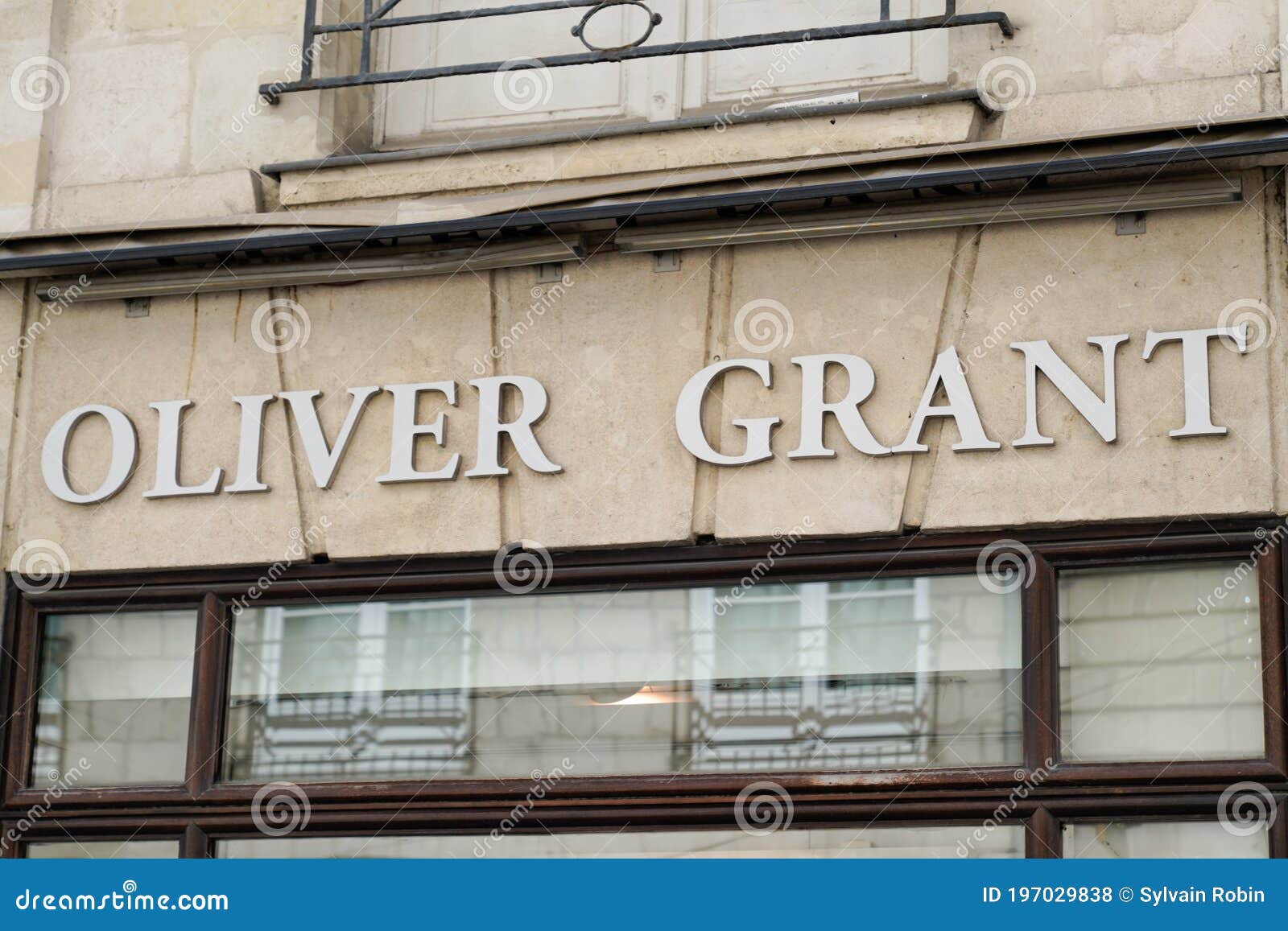 Oliver Grant Logo and Text Sign of Outlet Store Fashion Luxury Store ...