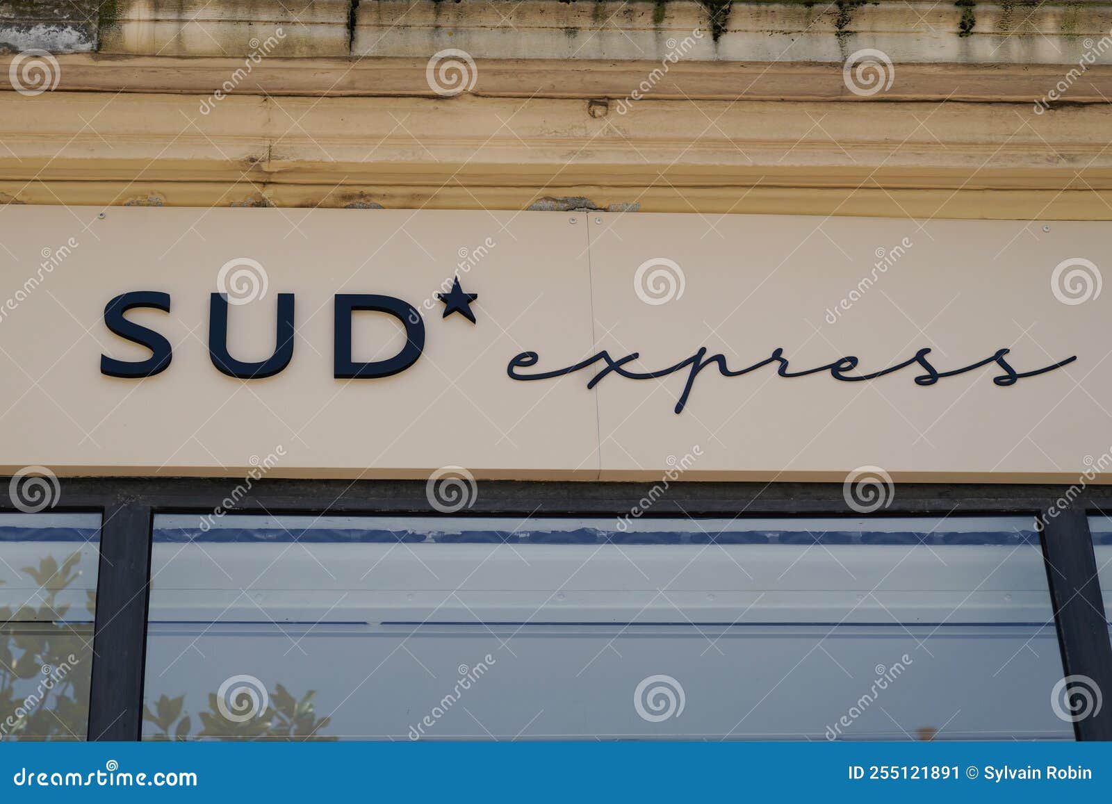 Sud Express Logo Sign and Brand Text on Store Facade Clothing Shop ...