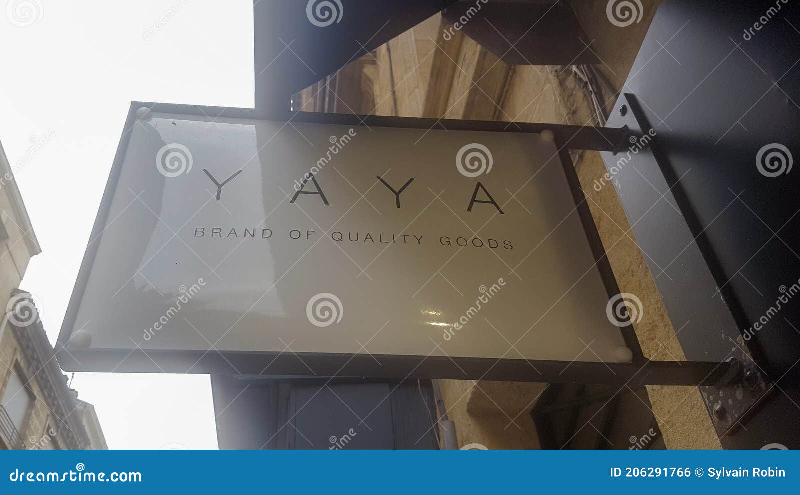 YAYA Sign Text and Logo Brand Front of Trendy Store Feminine Clothing ...