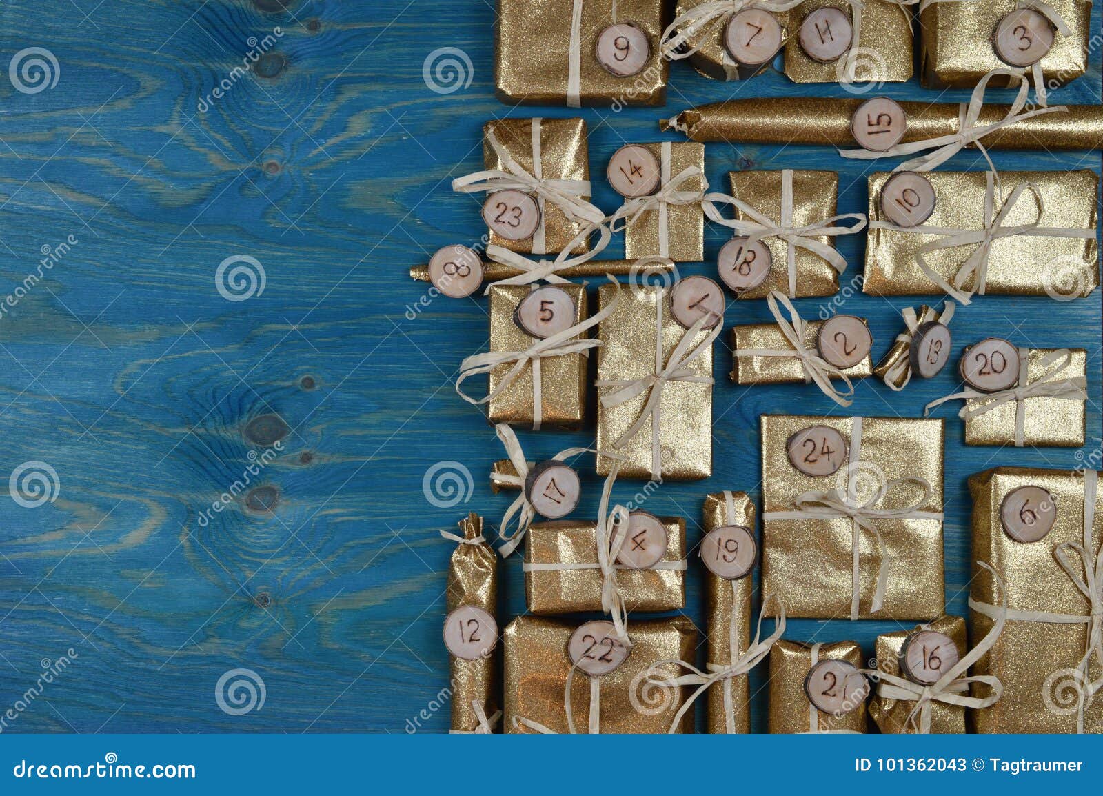 advent calendar with 24 golden presents on teal