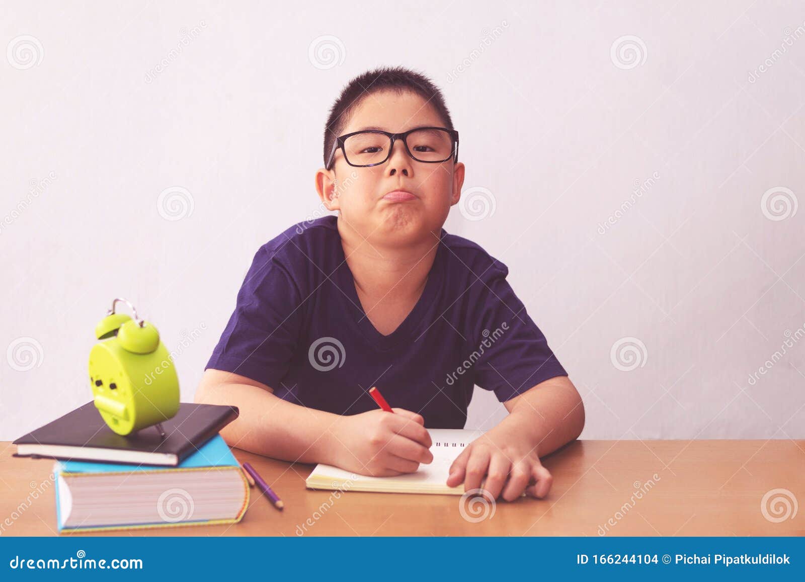 Bored And Tired Asian Student Boy Doing Homework Stock Photo Image