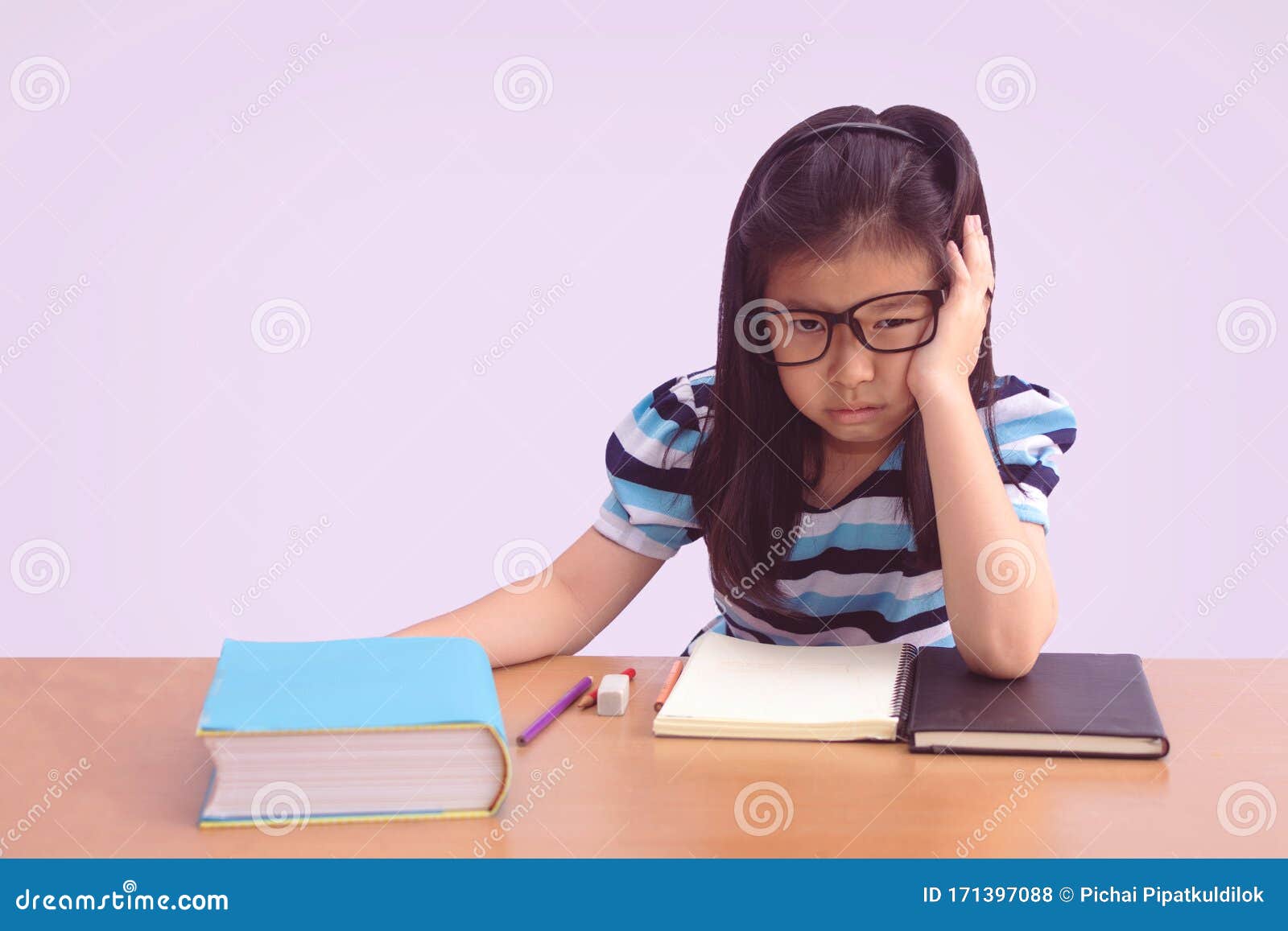 Bored And Tired Asian Student Girl Doing Homework Stock Photo Image