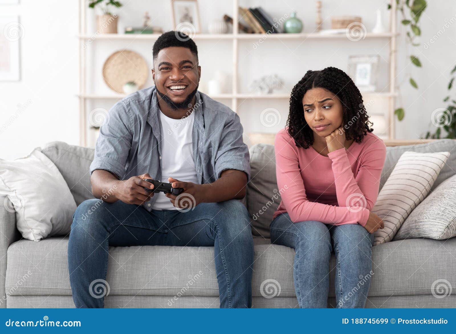 Boring Date. Excited Black Guy Playing Video Games and Ignoring Girlfriend  Next To Him Stock Image - Image of enjoy, conflict: 188745699