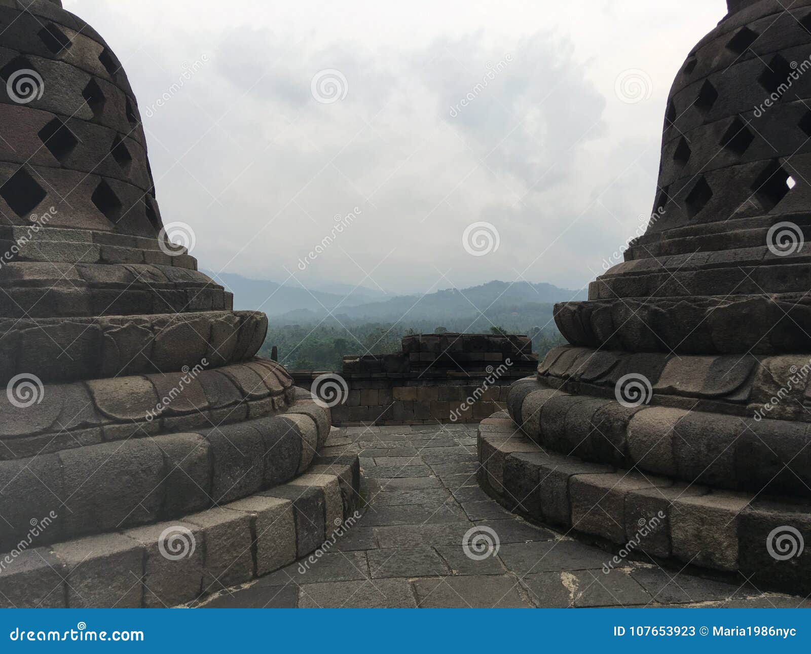 borobudur temple in java, indonesia on cloudy day.