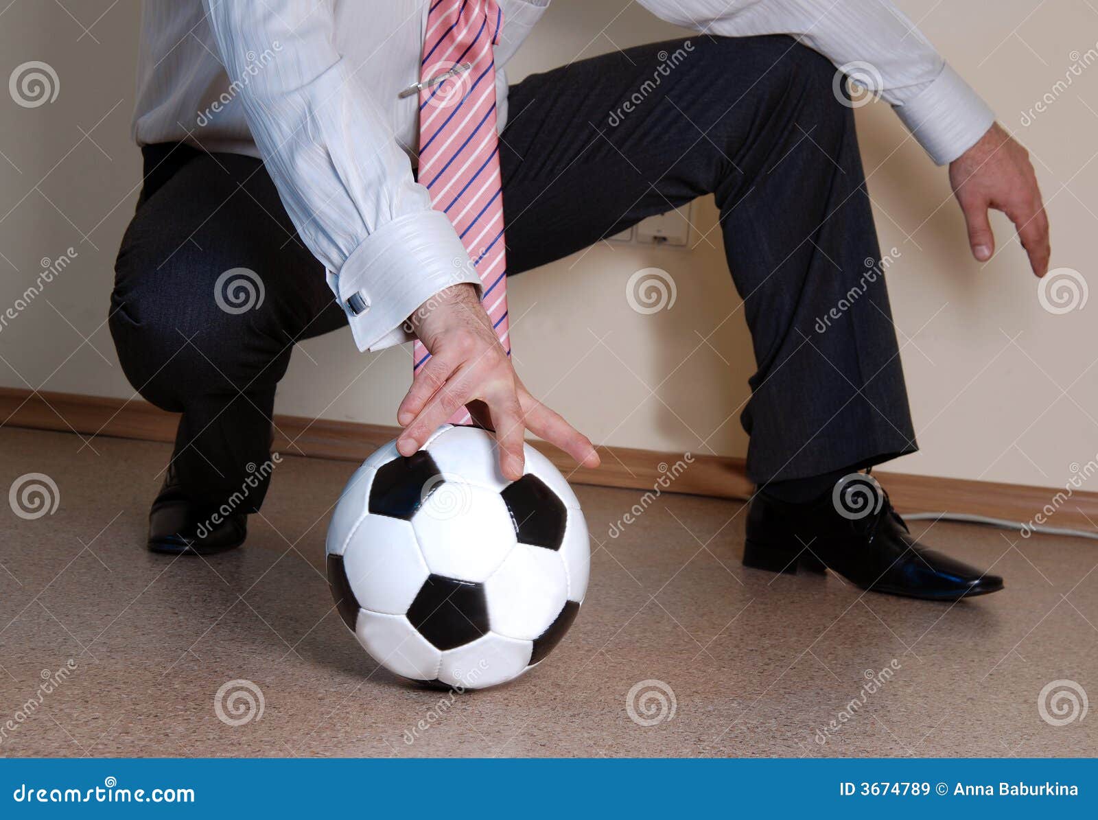Boss playing football stock image. Image of masculine 3674789
