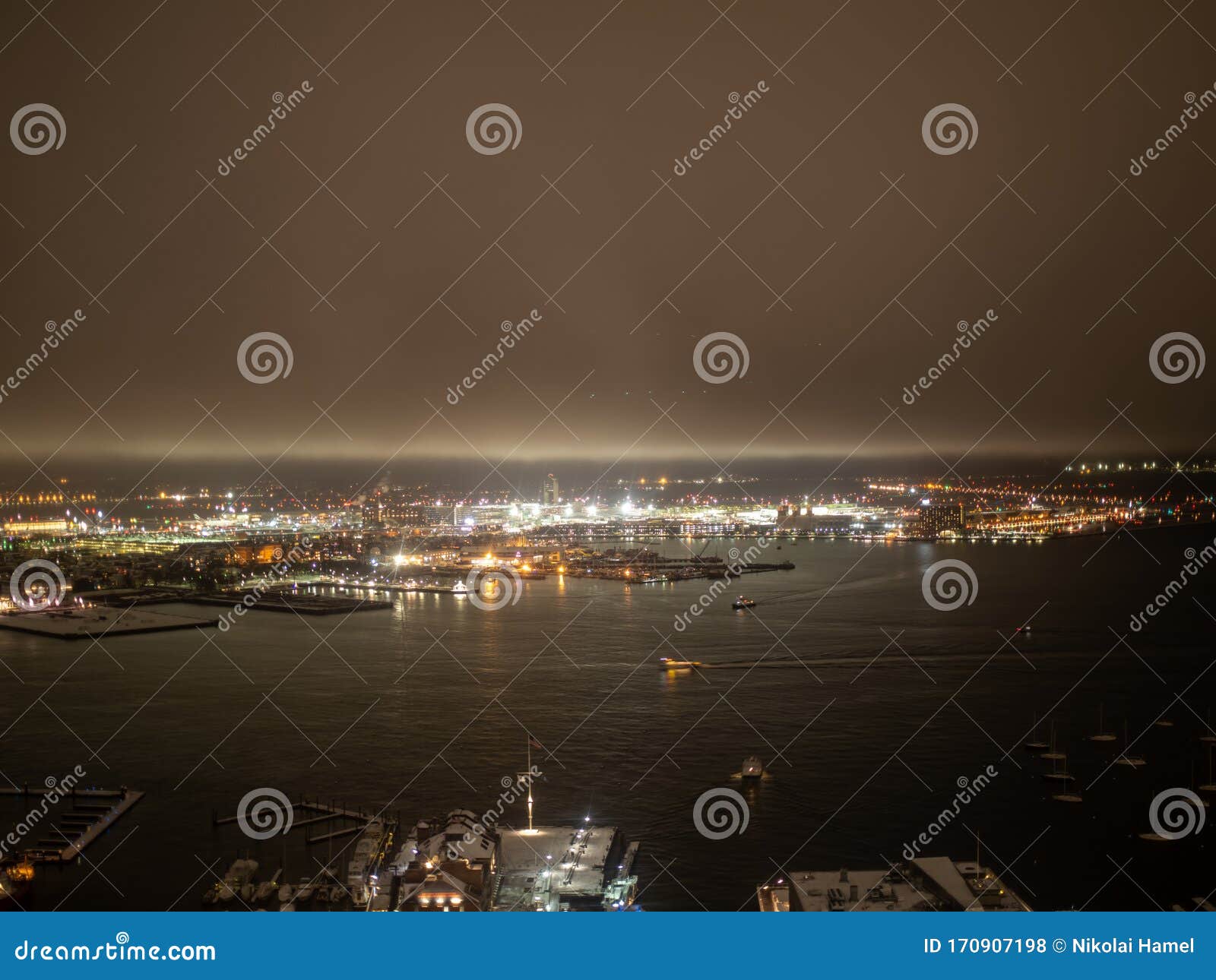 boston harbor as seen from a birds eye view at night in winter