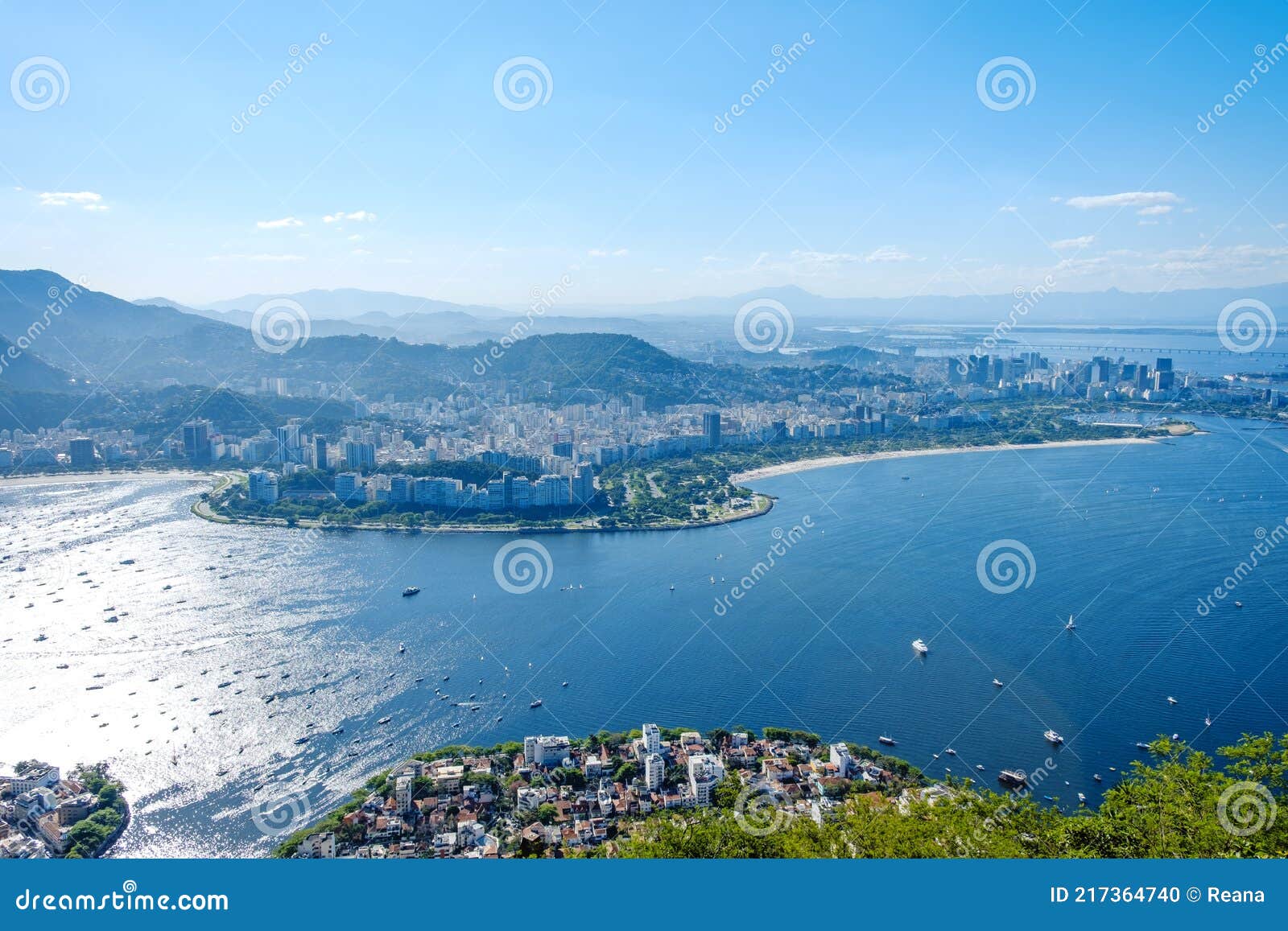 View of Botafogo district coastline with Guanabara bay waters full of  sailboats and vessels anchored nearby the Yatch Club under summer sunny day  Stock Photo - Alamy