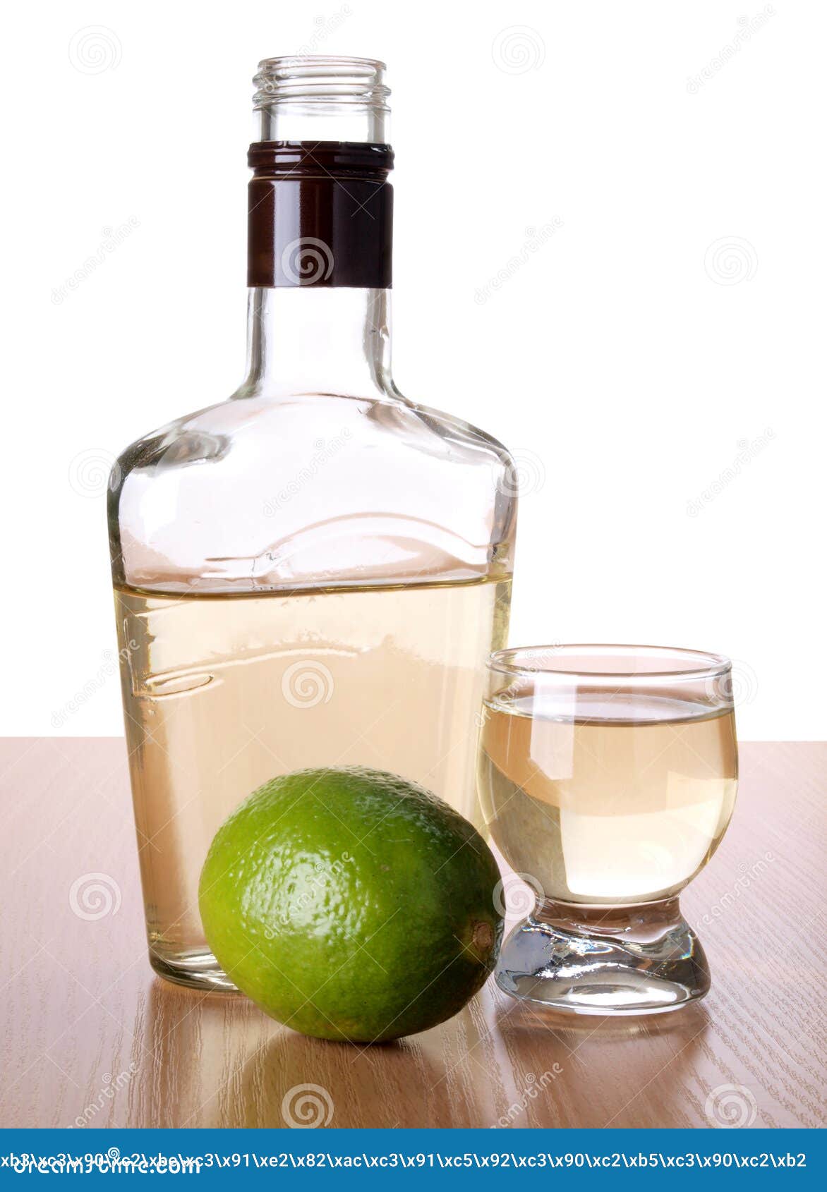 Botella Y Limón Del Tequila Foto de archivo Imagen 21642360