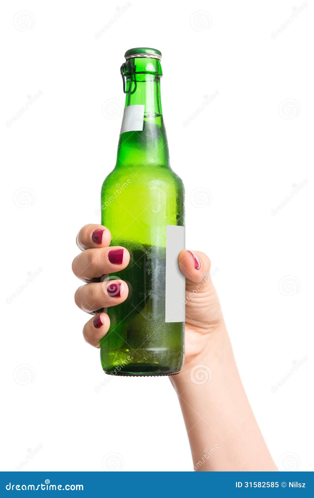 Bottle of beer in hand stock image. Image of isolated 31582585