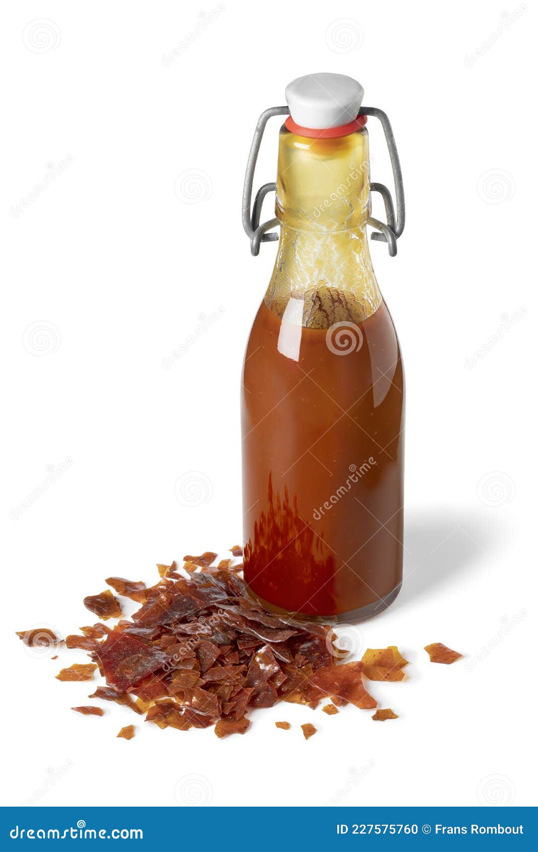 bottle of brown shellac liquid on white background
