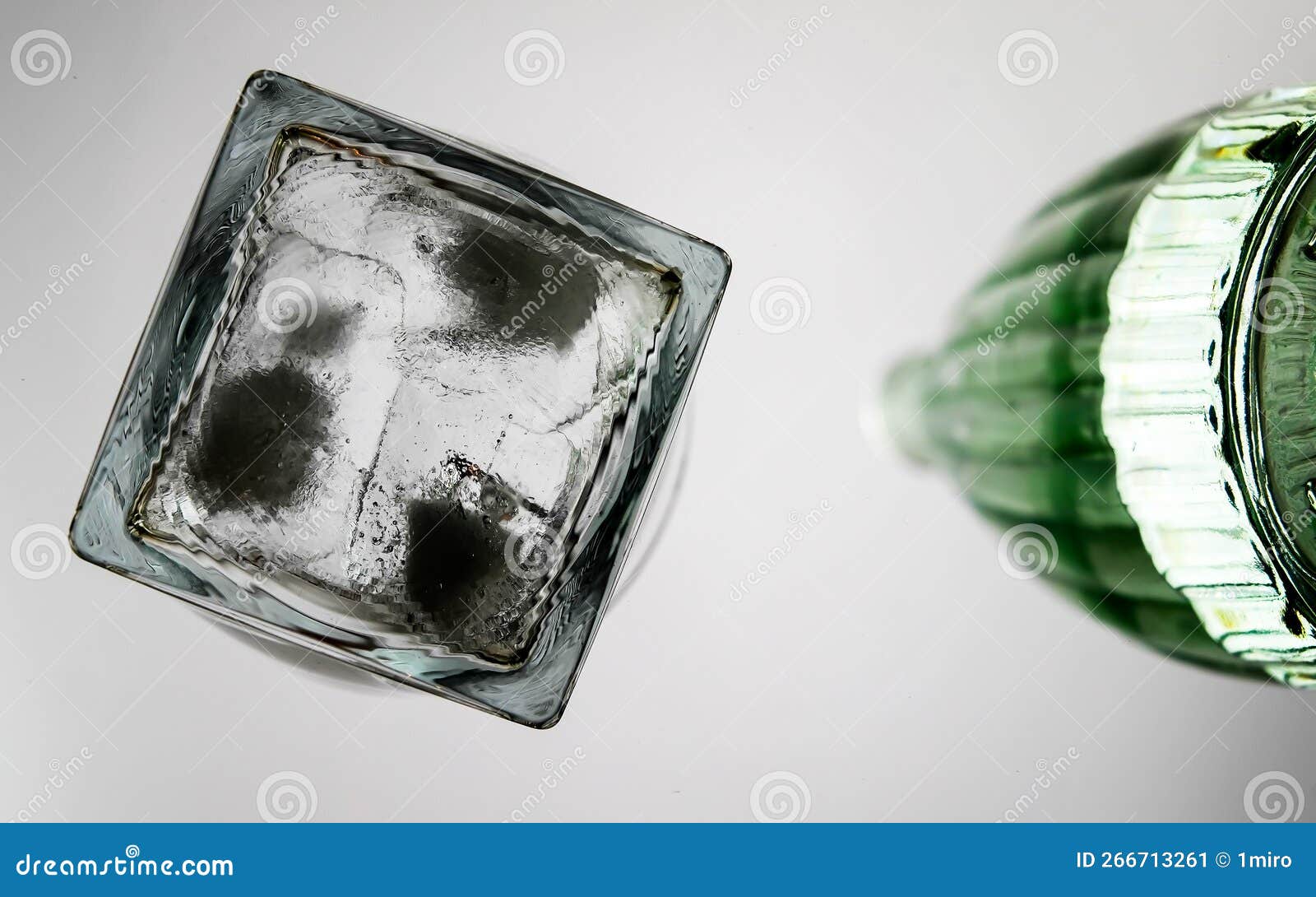 Bottle with Drink and Ice on Table from Below Stock Image Image of