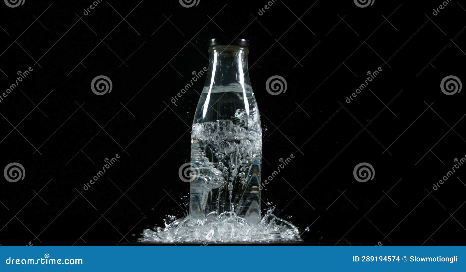 Bottle Falling and Exploding on Black Background Stock Photo Image of