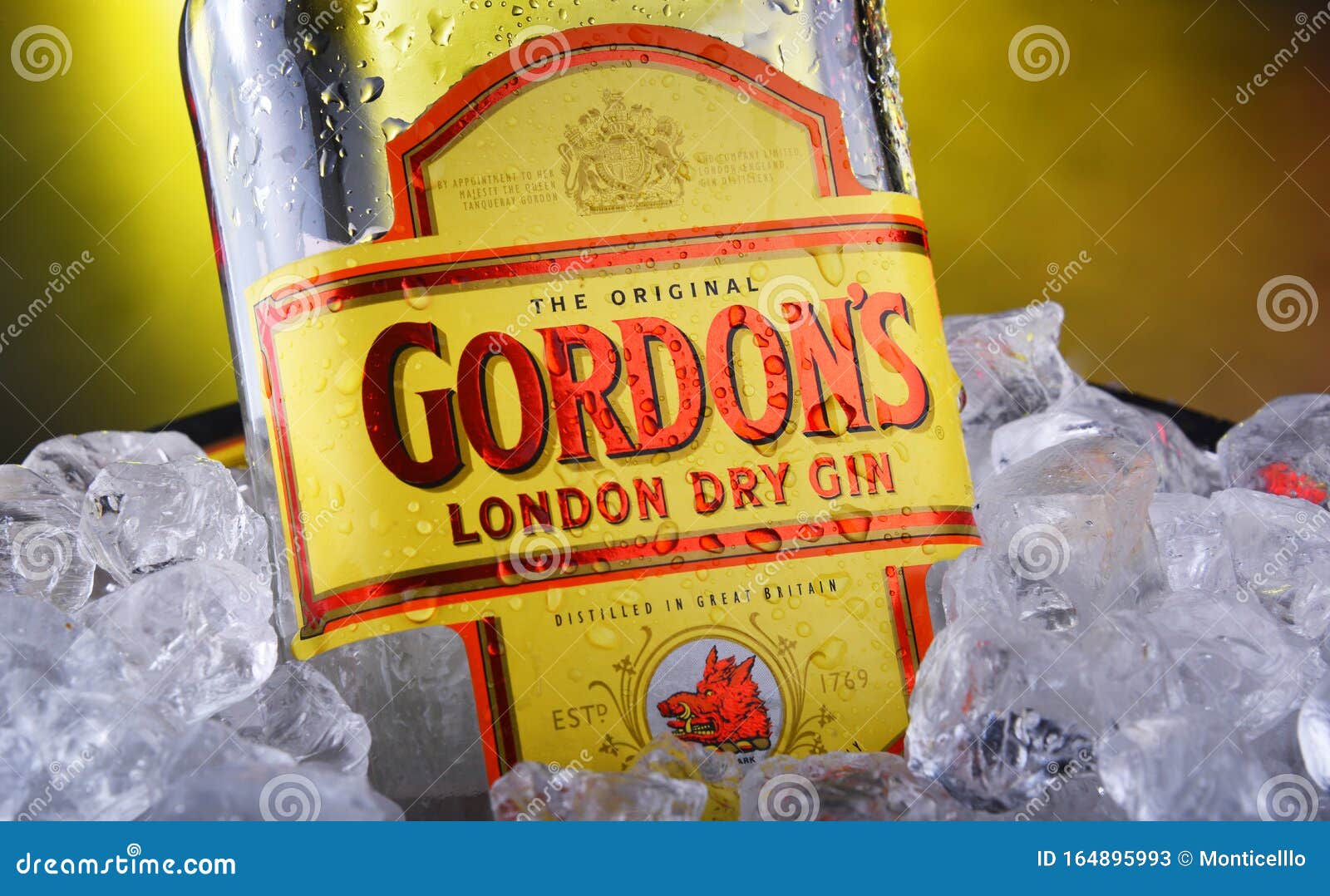 Bottle of Gordon`s London Dry Gin in Bucket with Crushed Ice Editorial ...