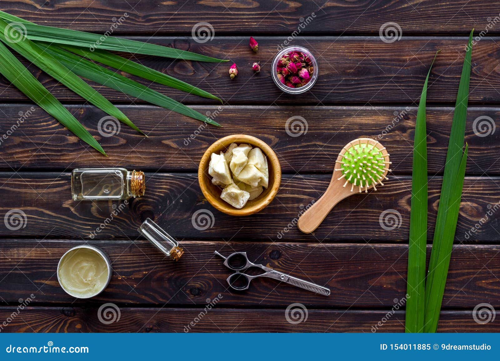 Download Bottle With Jojoba, Argan Or Coconut Oil, Styling, Comb For Hair Style On Wooden Background Top ...