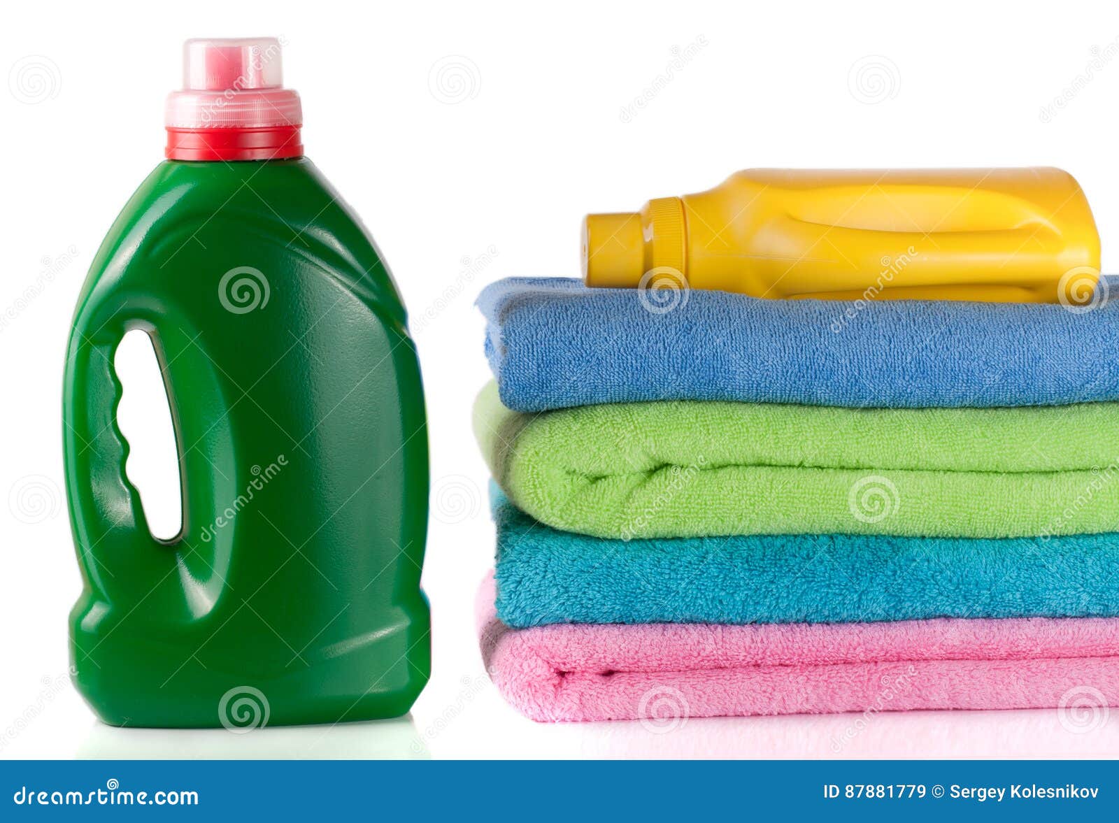 Bottle Laundry Detergent and Conditioner with Towels Isolated on White