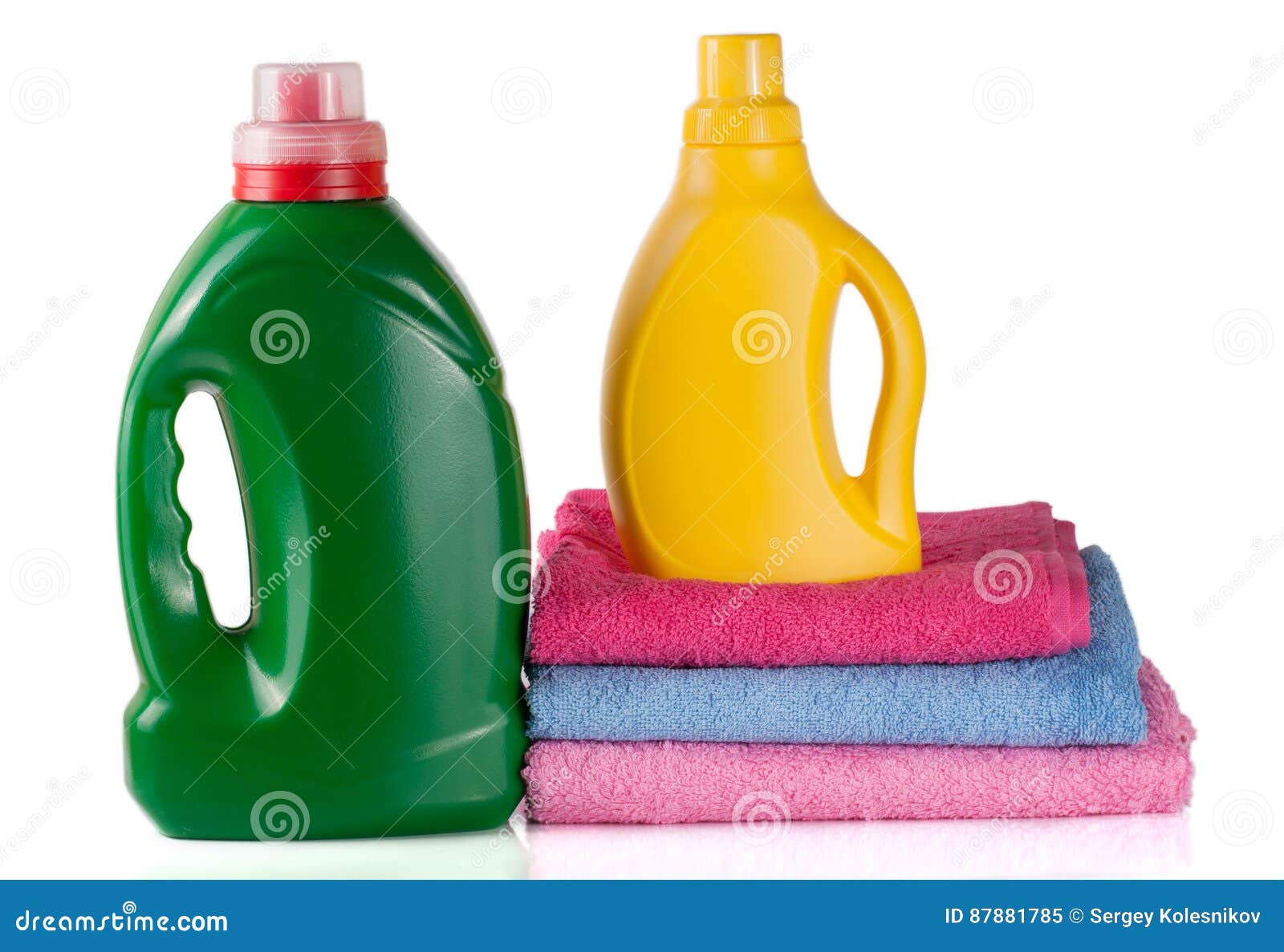 Bottle Laundry Detergent and Conditioner with Towels Isolated on White