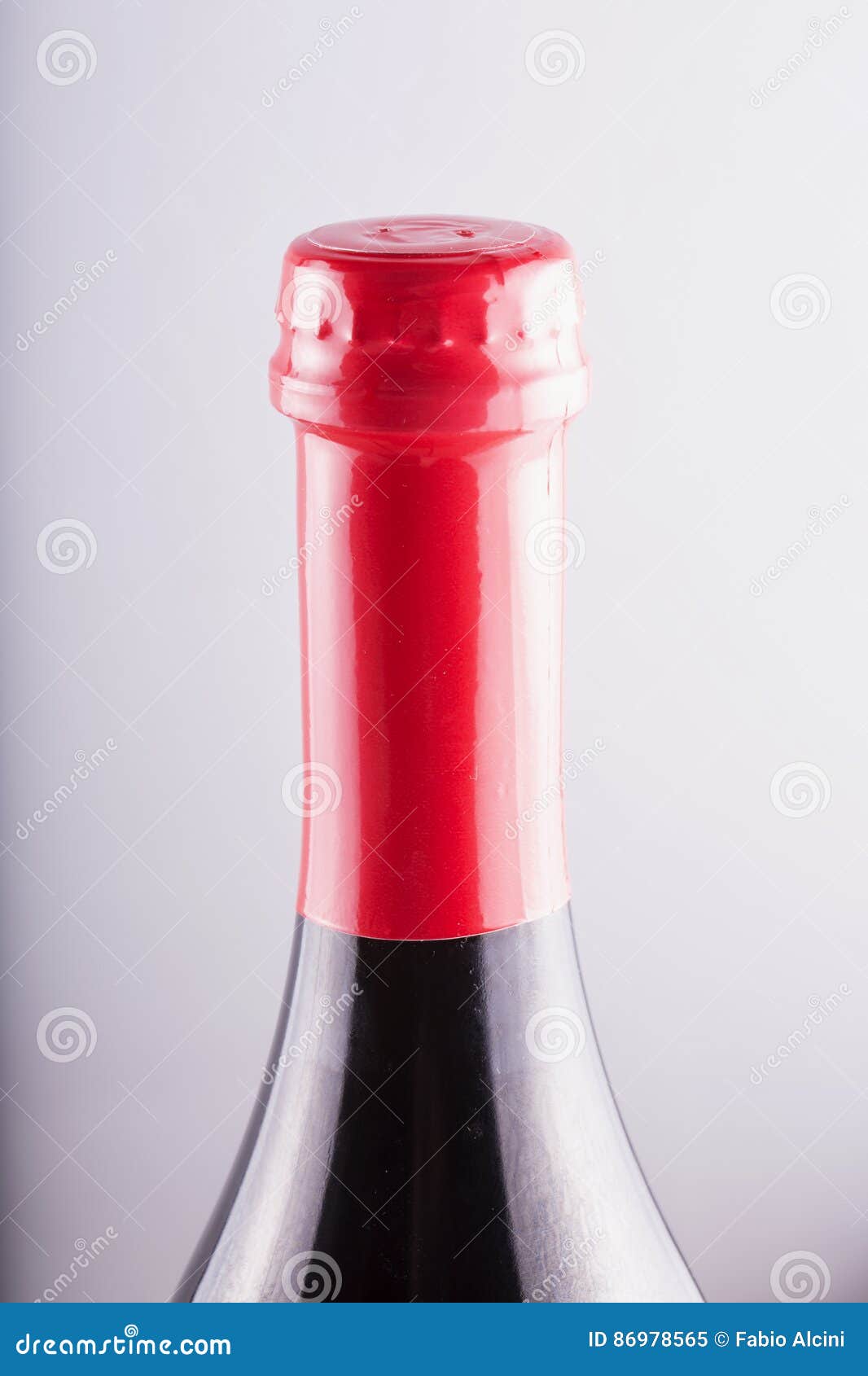 Bottle neck with red cap stock image. Image of beverage 86978565