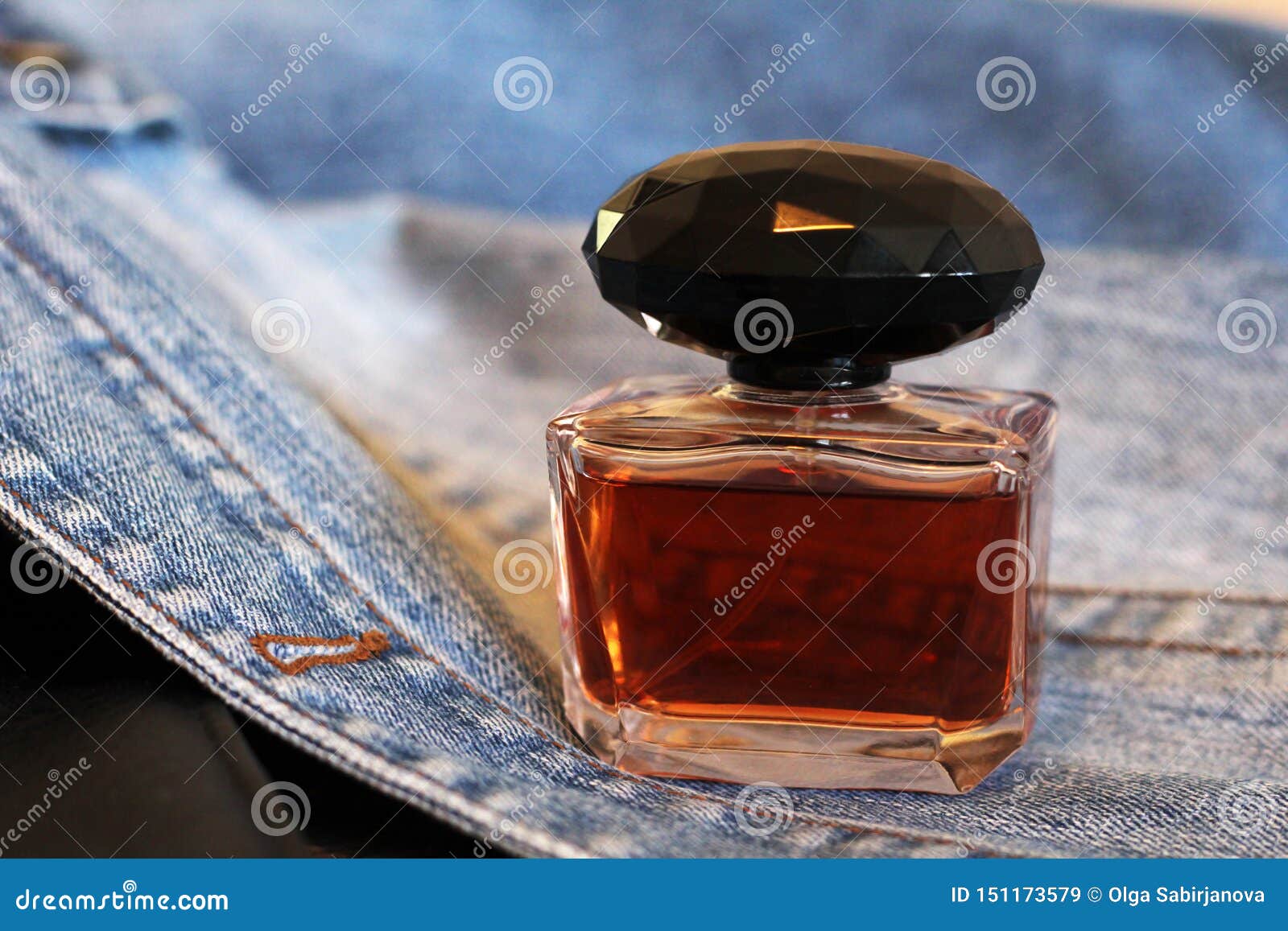 Bottle of Perfume on the Jeans, Brown Color Stock Image Image of