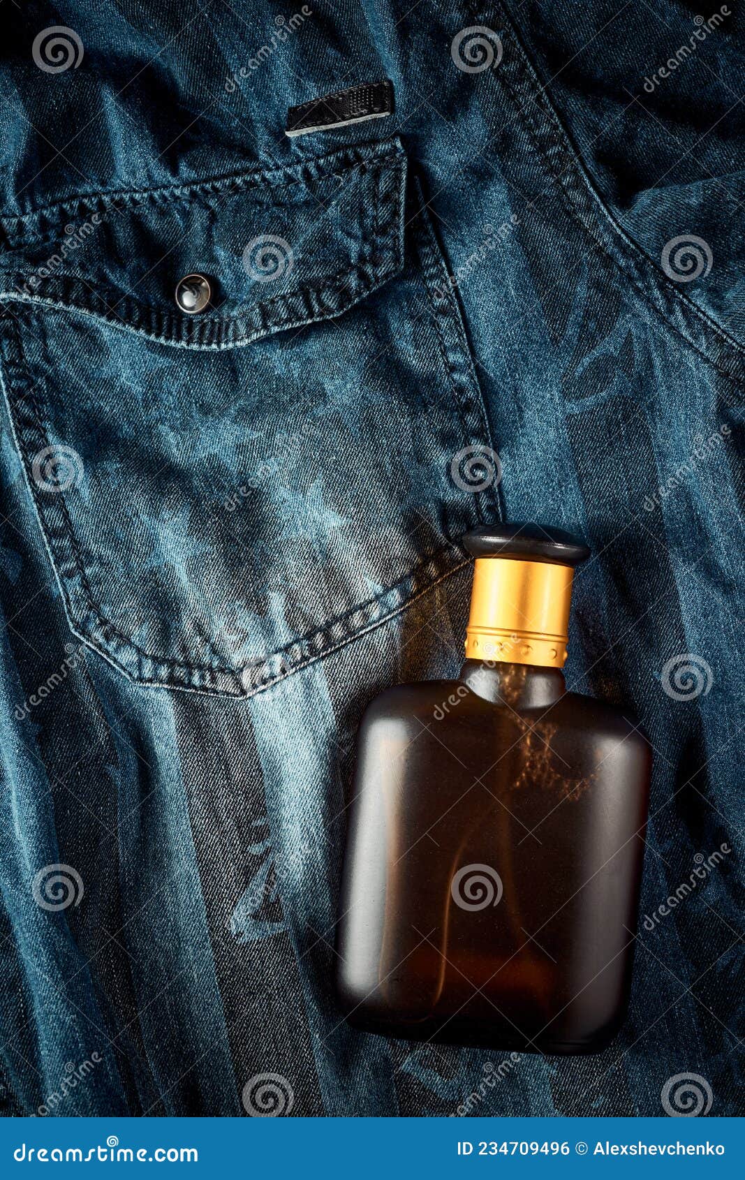 A Bottle of Perfume for Men on Denim Jeans Background, Male Style, the  Scent of a Man Stock Photo - Image of accessory, bottle: 234709496