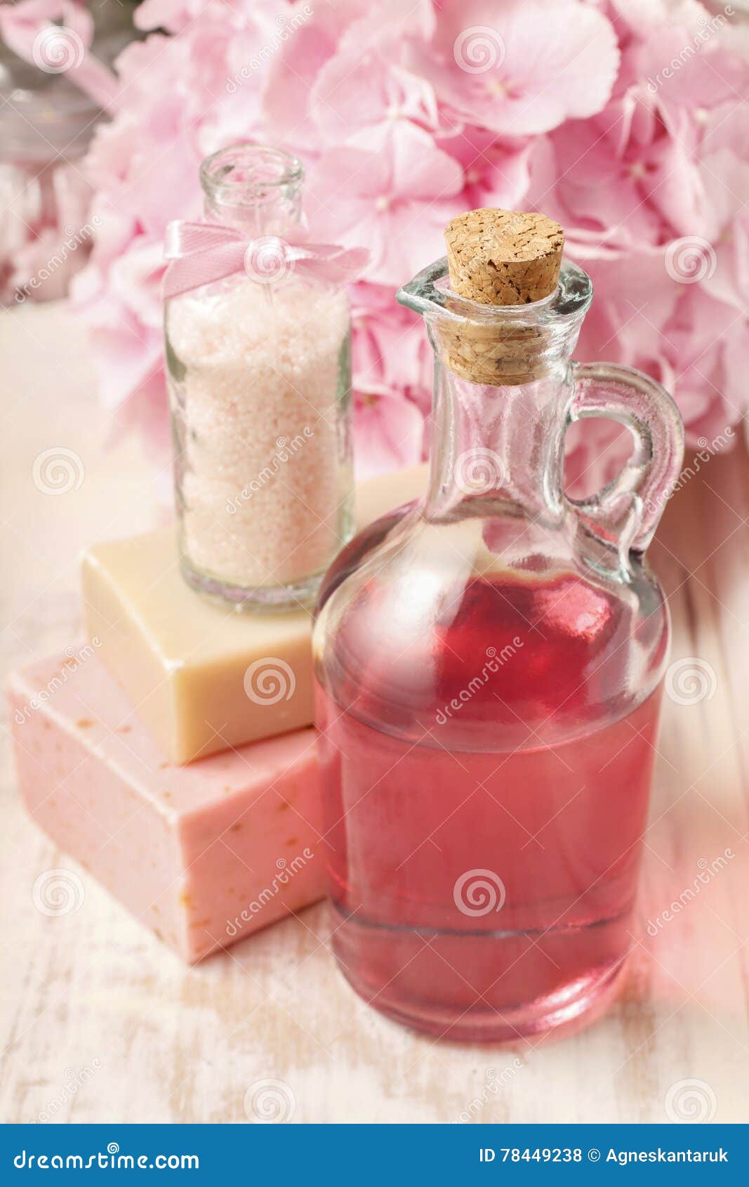 Bottle of Pink Liquid Soap and Bottle of Sea Salt Stock Photo Image