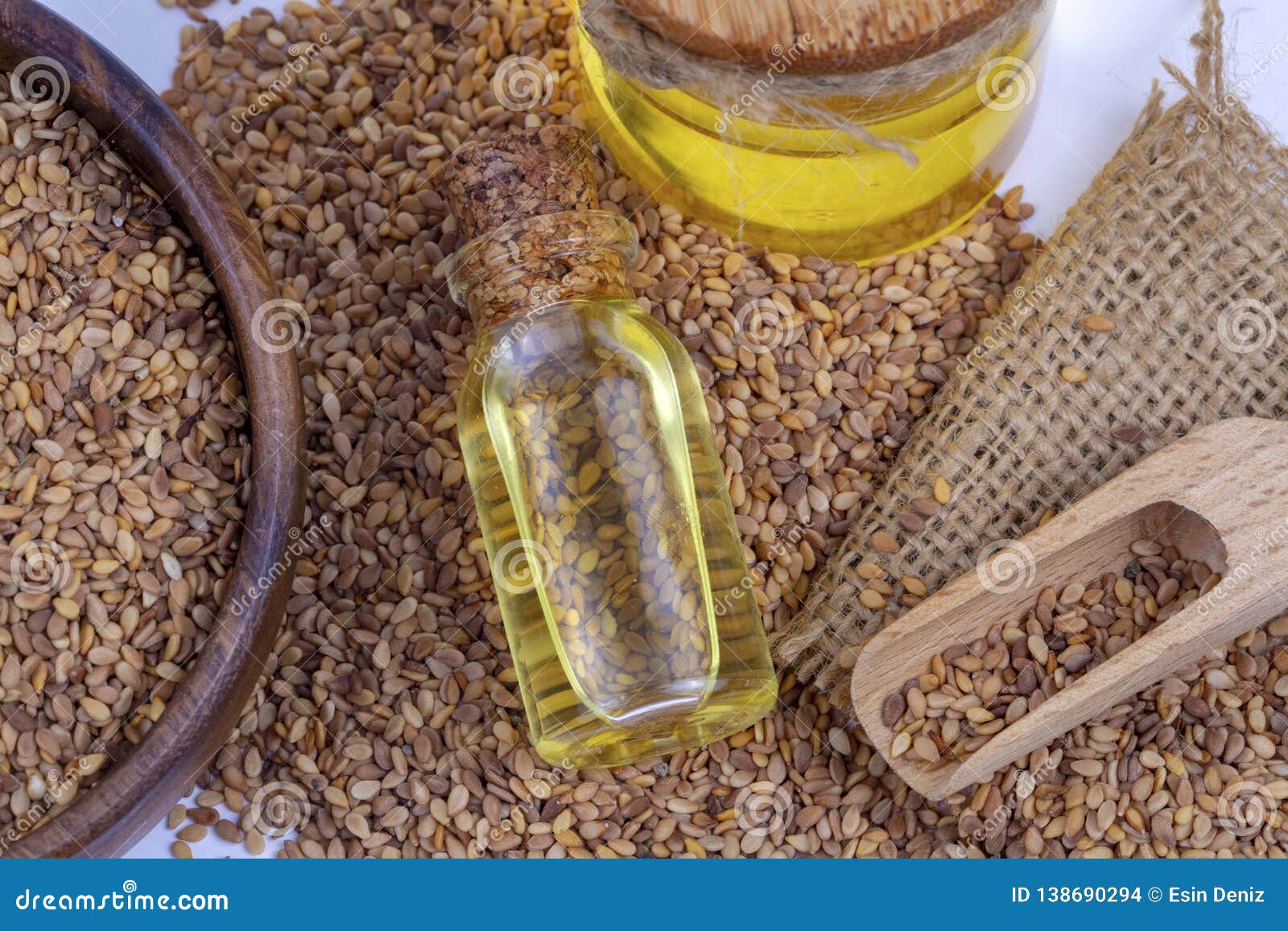 Bottle of Sesame Oil and Sesame Seeds Stock Photo Image of background