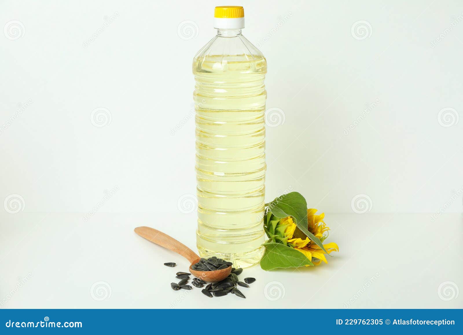 Bottle of Sunflower Oil and Ingredients on White Background Stock Image