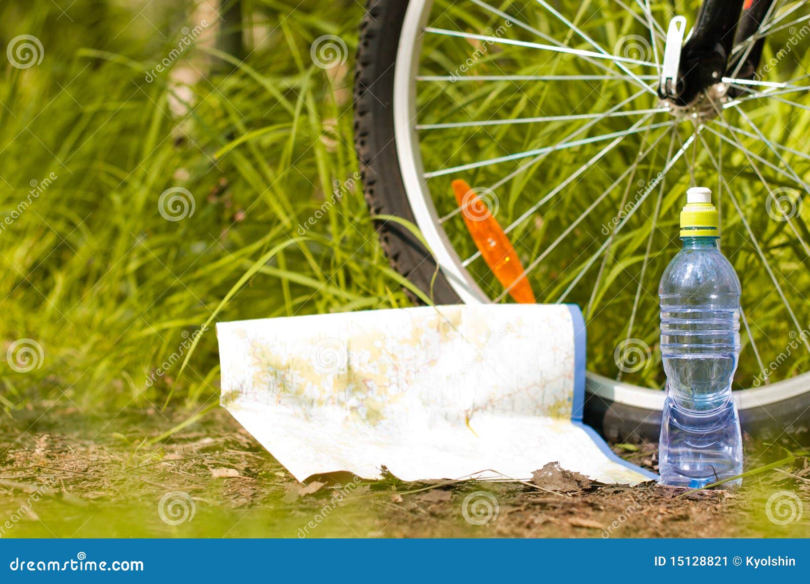Bottle of Water and Near Bicycle Wheel Stock Image Image of outdoor