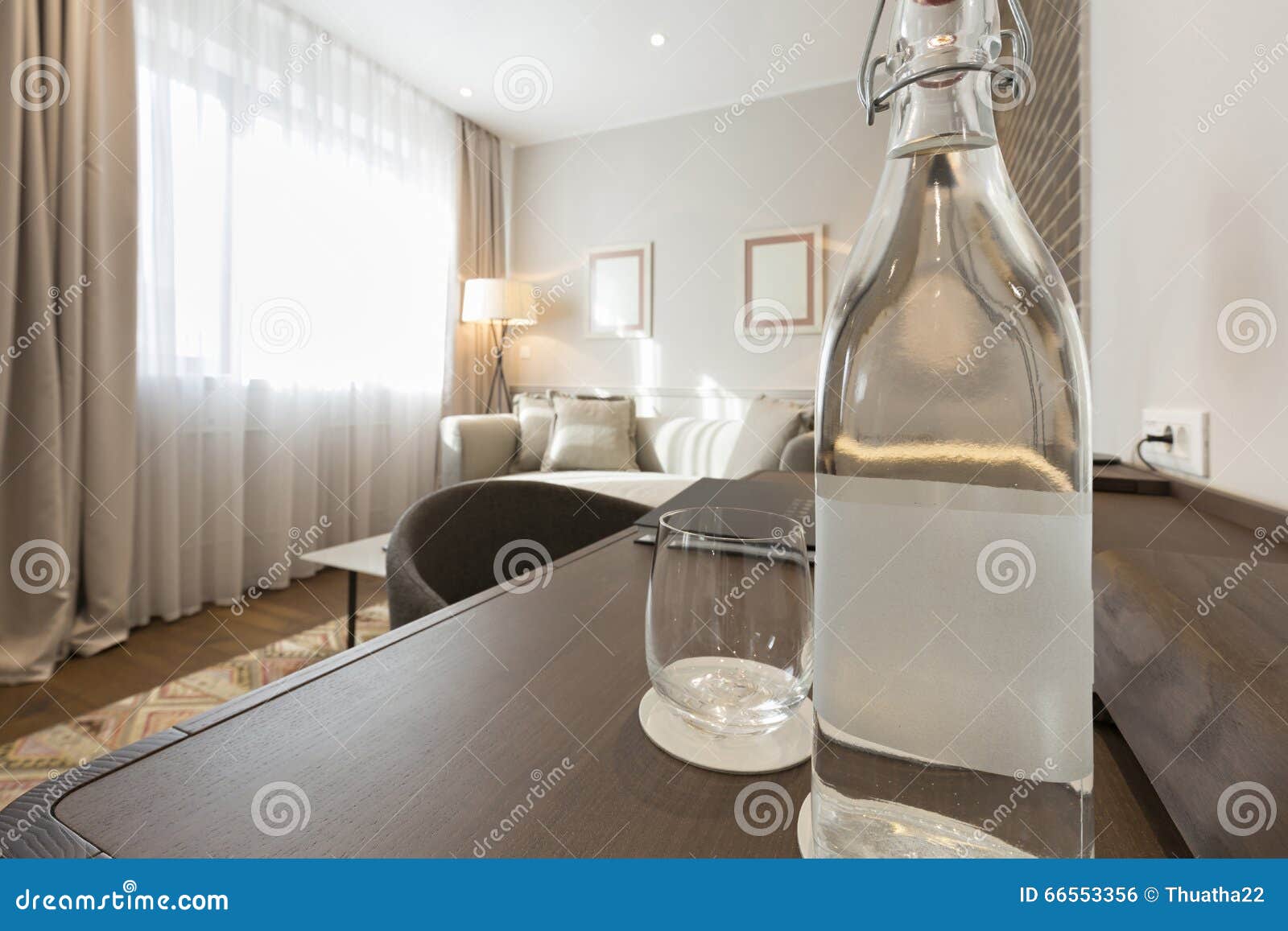 Bottle of Water on Wooden Table in Hotel Room Stock Photo Image of