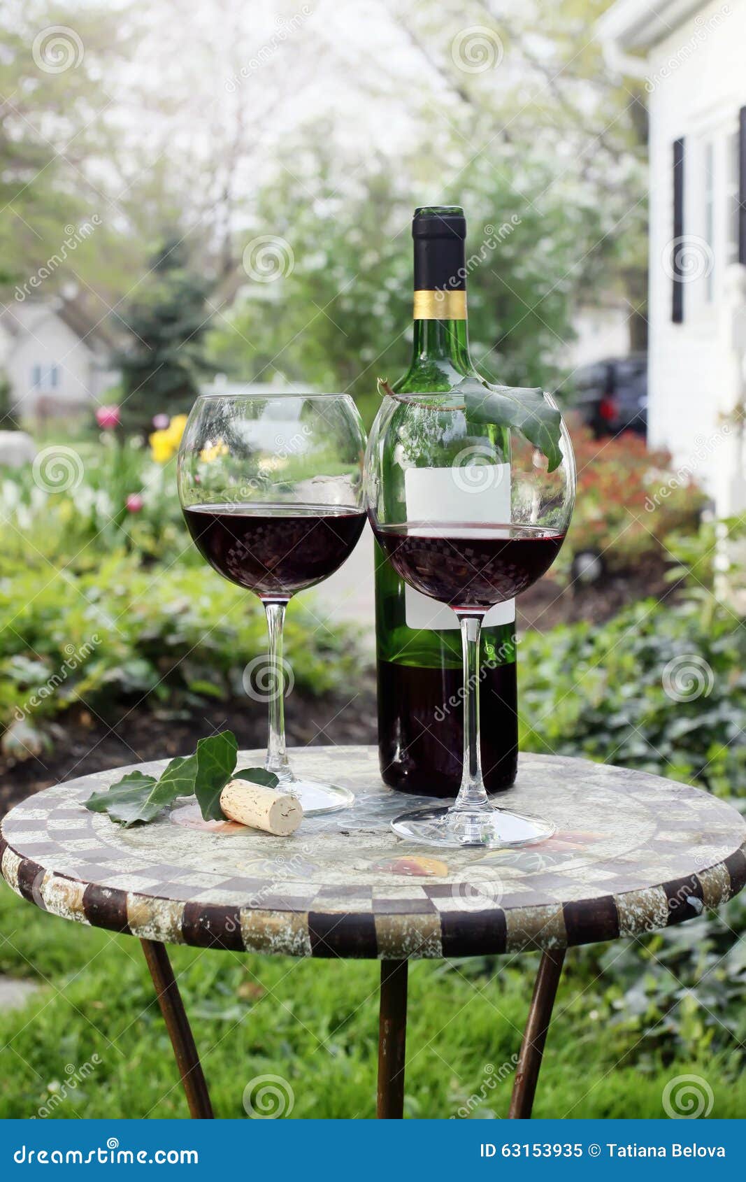 Bottle of Wine and Glasses on a Garden Table Stock Image Image of