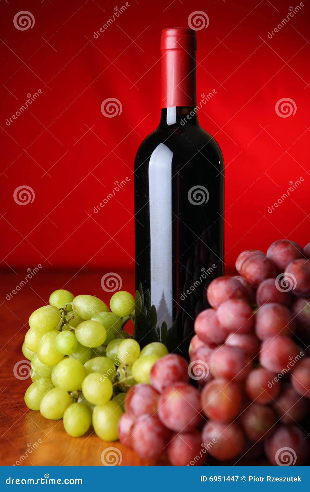 Bottle of wine and grapes stock image. Image of liquid 6951447