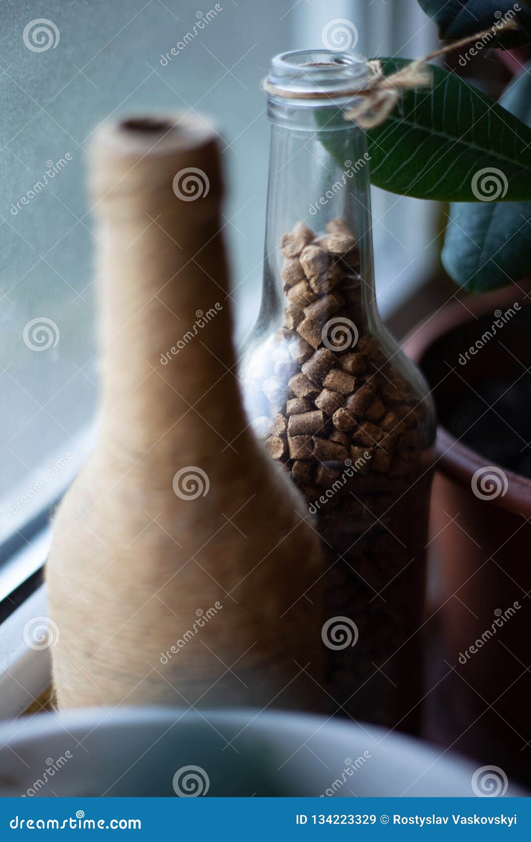 Bottle with wooden grains stock image. Image of green 134223329