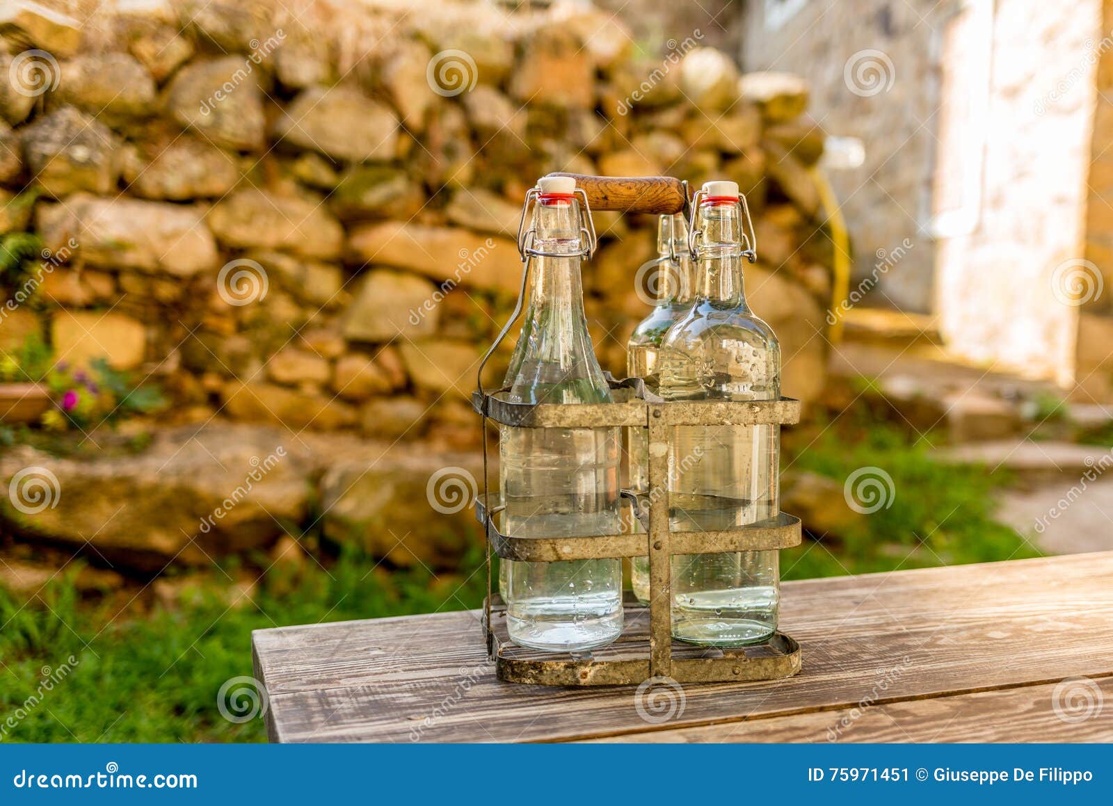 Bottles of Cold Spring Water during Summer Stock Image Image of drops