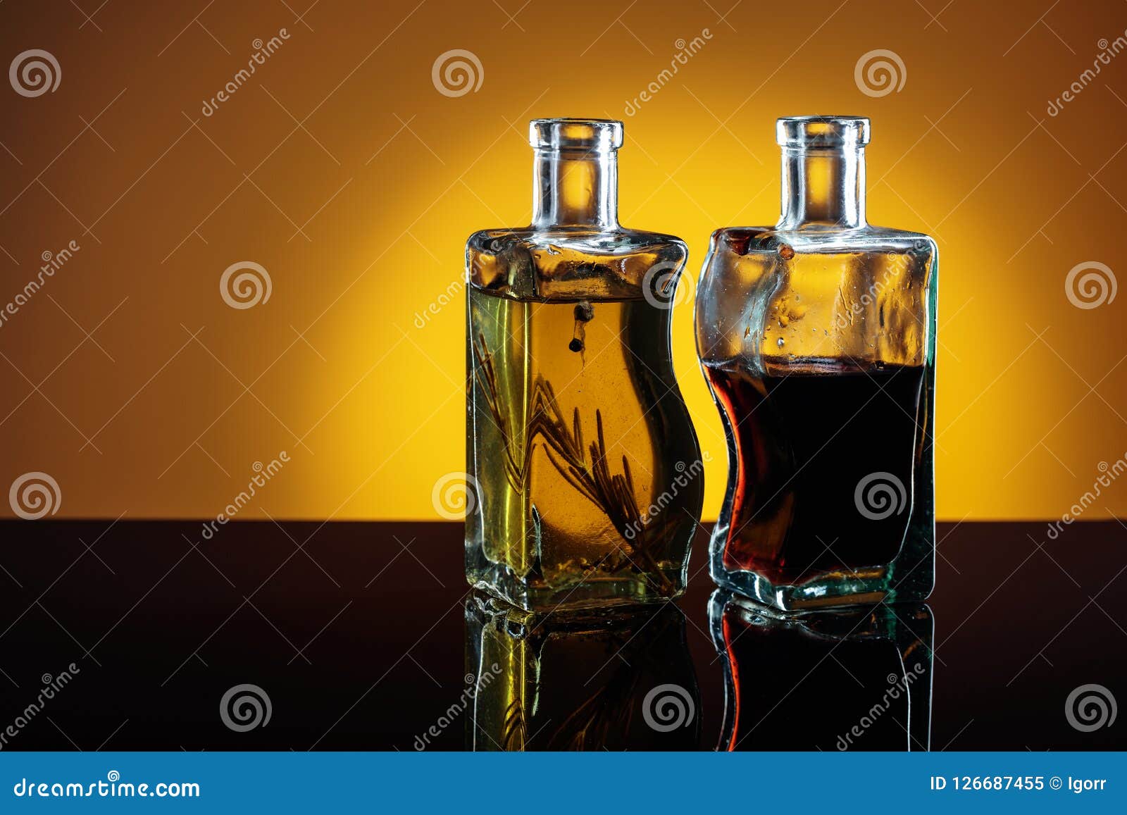 Bottles of Flavored Olive Oil and Balsamic Vinegar . Stock Image