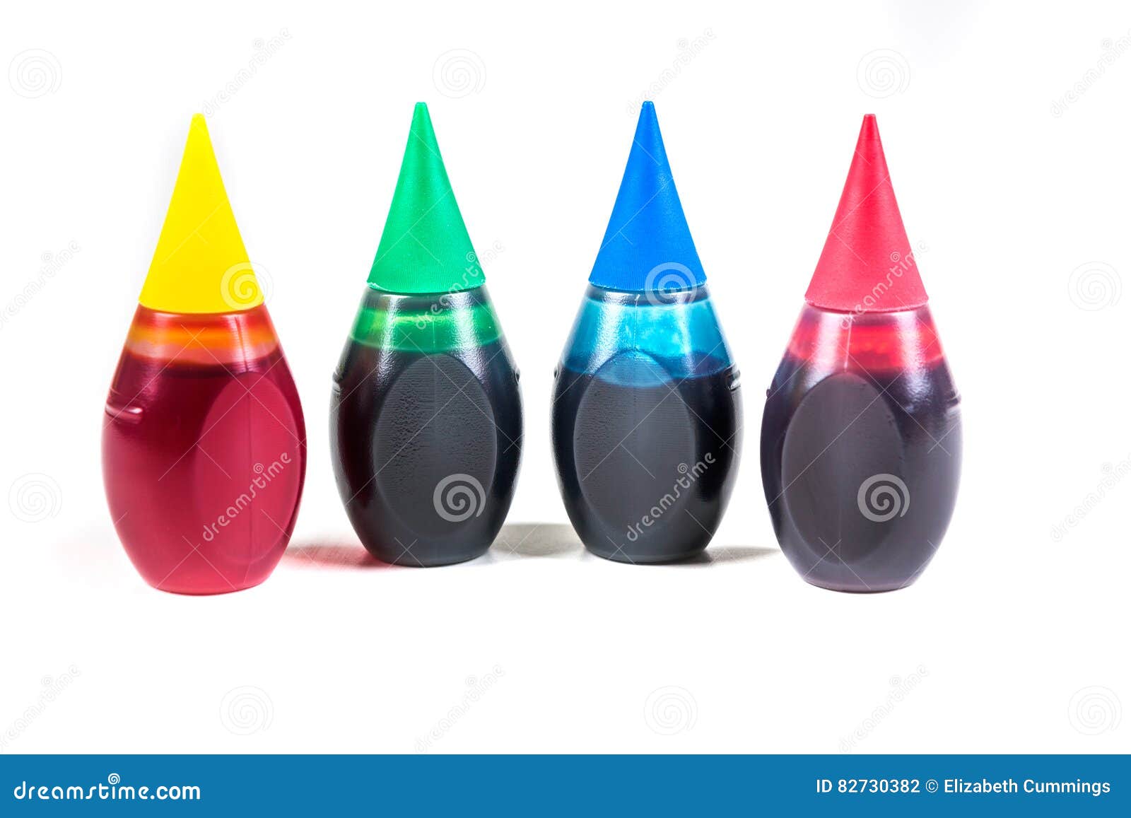 4 bottles of food coloring stock photo. Image of bright 82730382