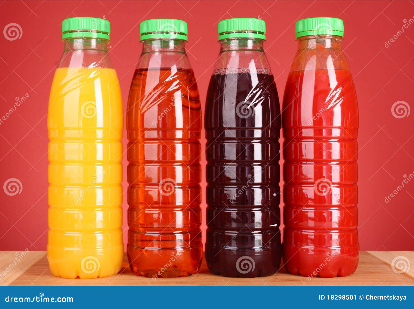 Bottles Of Juice On Red Stock Image Image 18298501