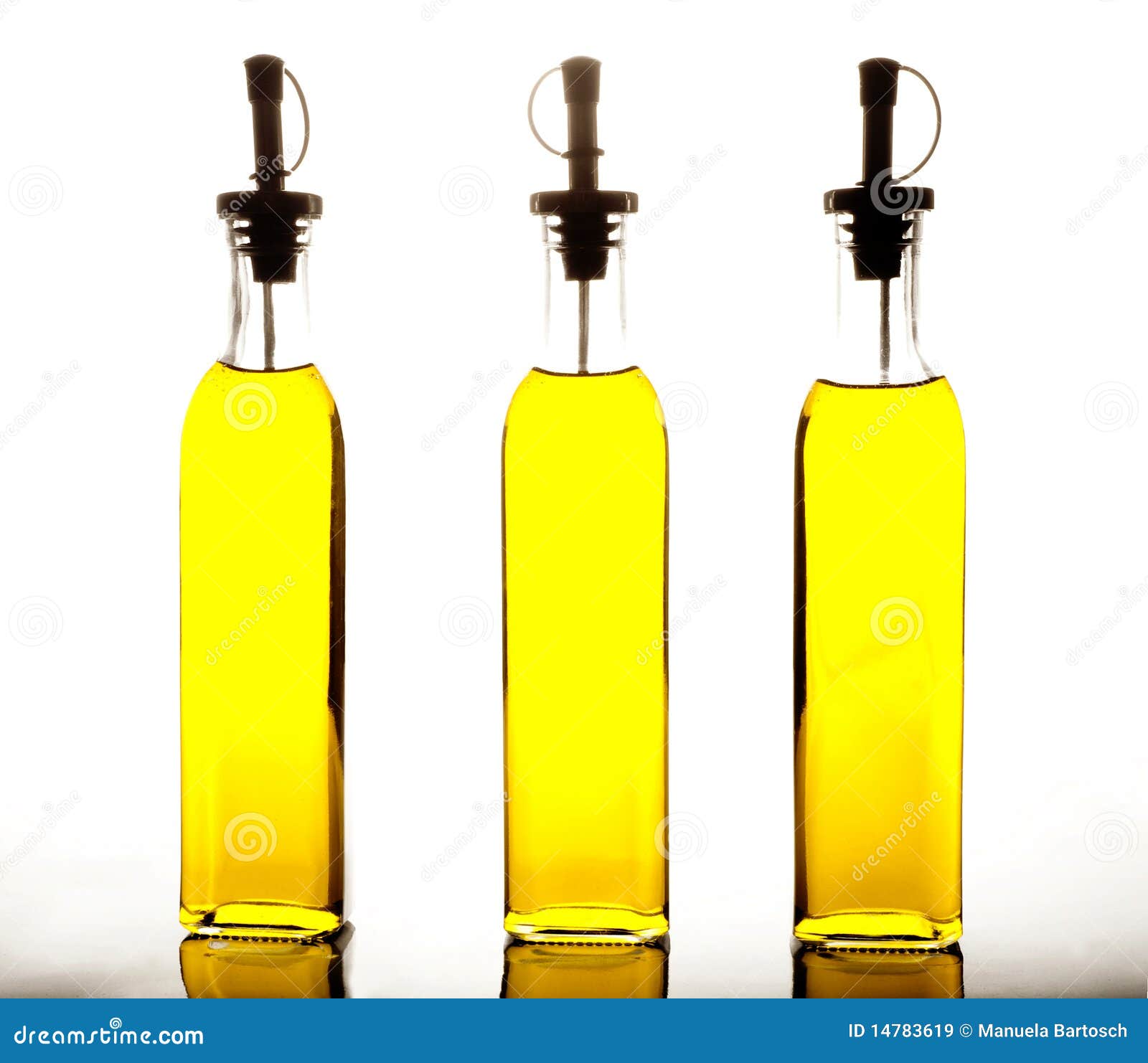 Bottles of olive oil on white background