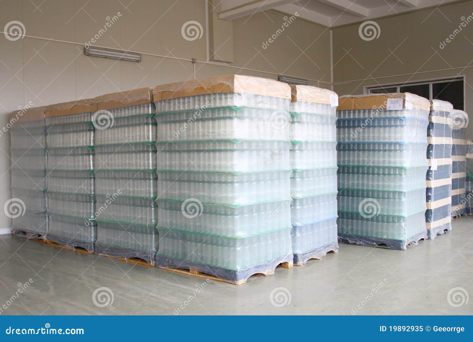 Bottles stored in depot stock image. Image of stacking 19892935