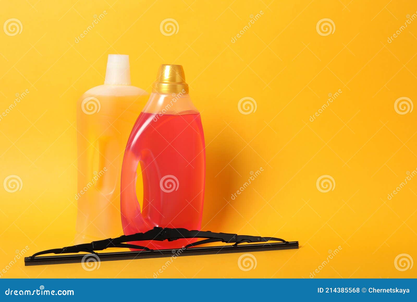 Bottles of Windshield Washer Fluids and Wiper on Yellow Background. Space  for Text Stock Photo - Image of vehicle, space: 214385568