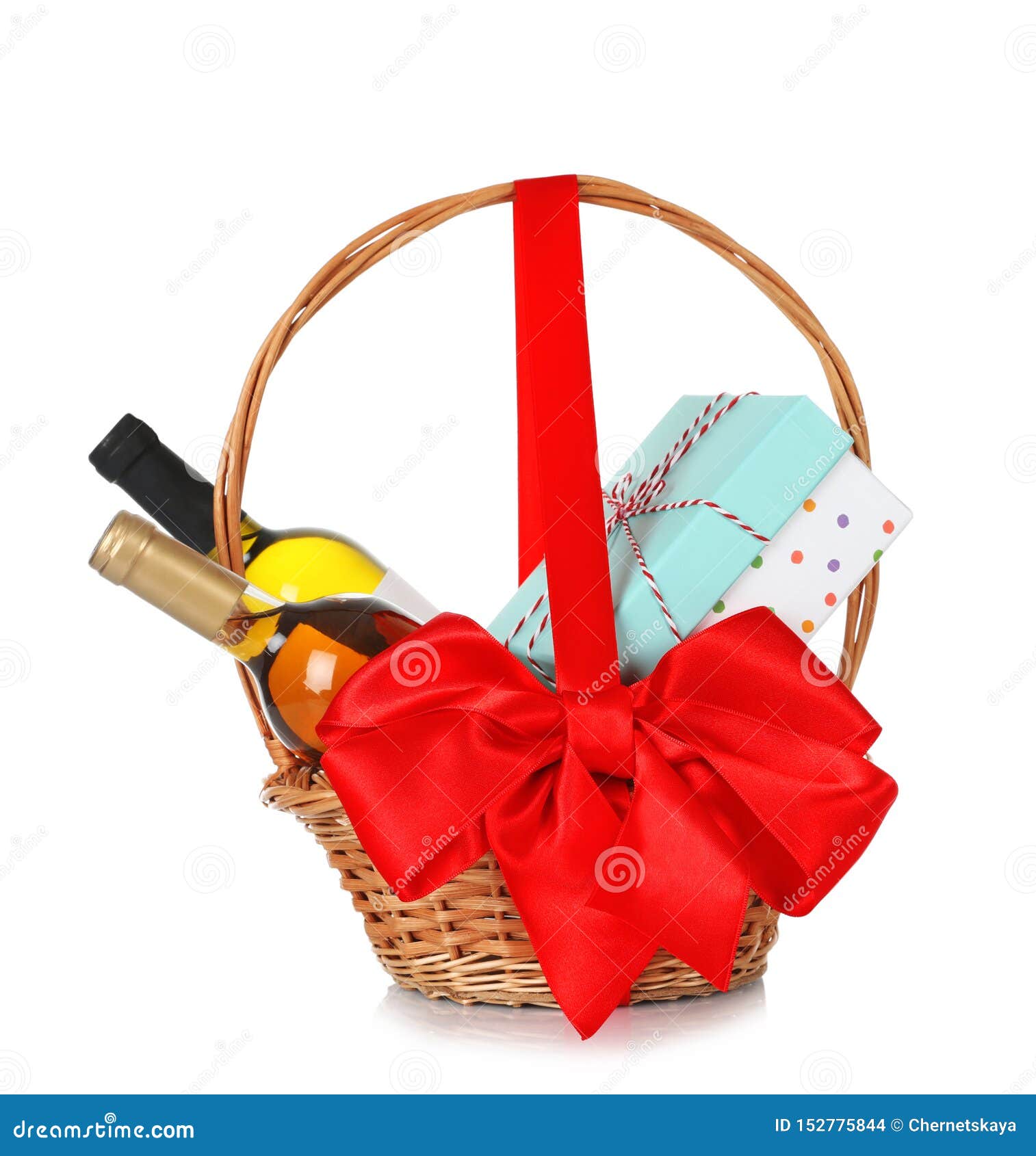 Bottles of Wine and Gift Box in Wicker Basket with Red Bow on White