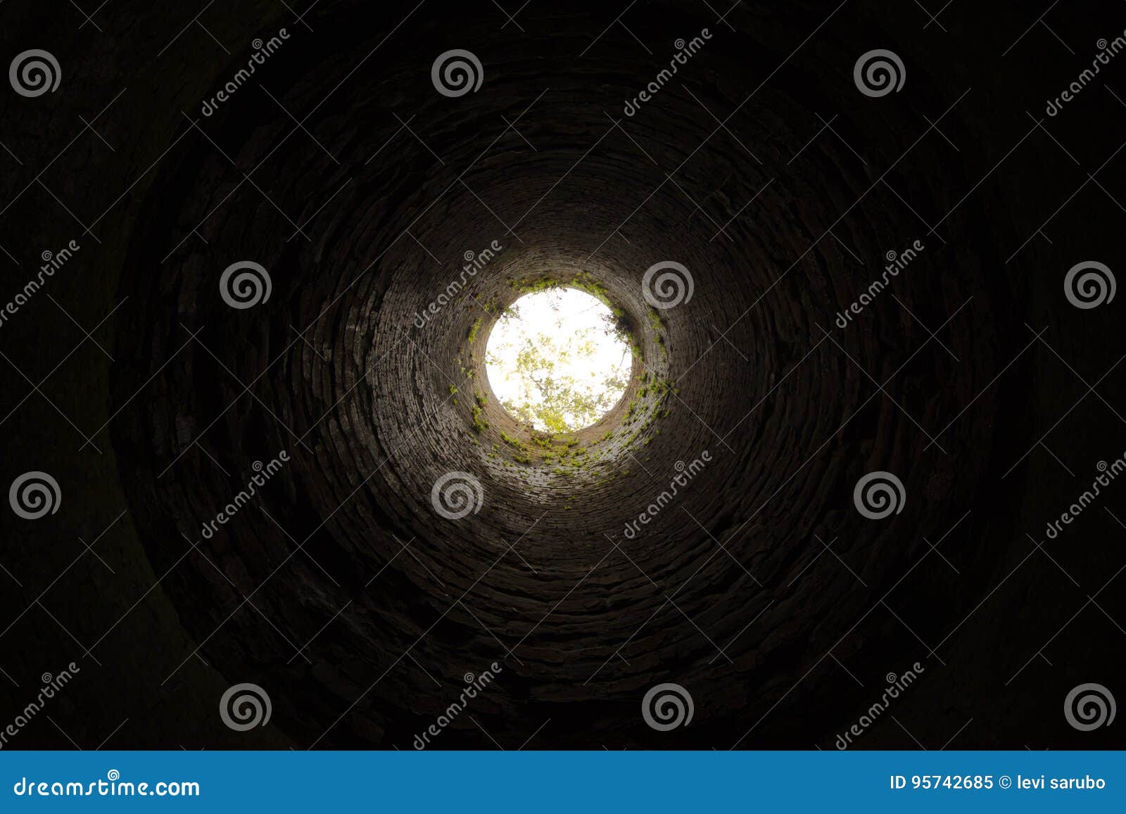 from the bottom of the hole, a well in ruins very ancient