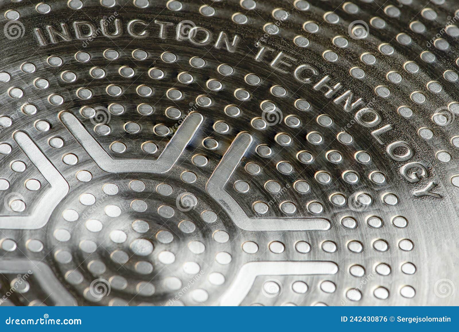 bottom of induction cookware. texture of a non-stick induction pan close-up